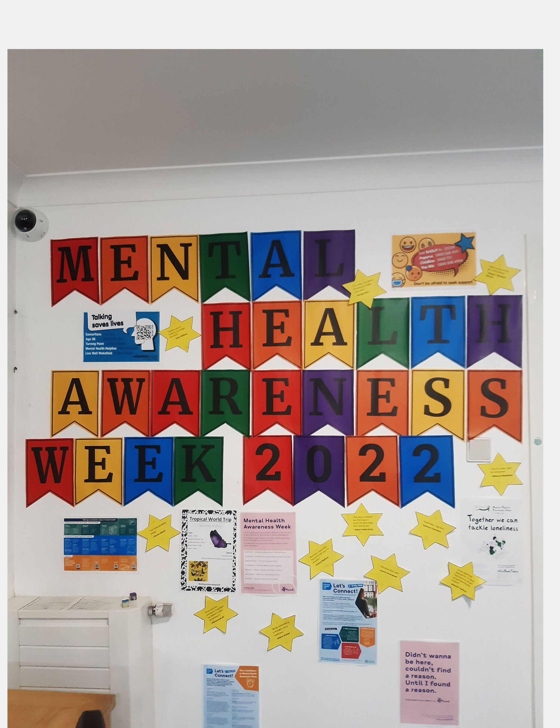 coloured bunting spelling "Mental Health Awareness Week 2022"