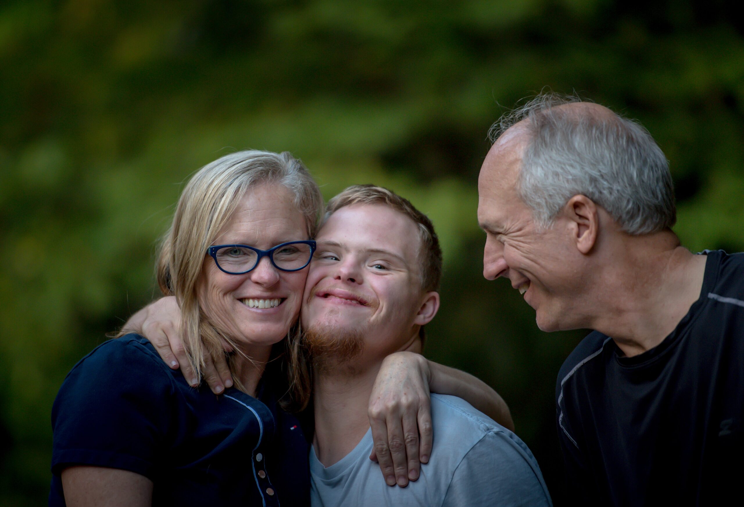3 people hugging
