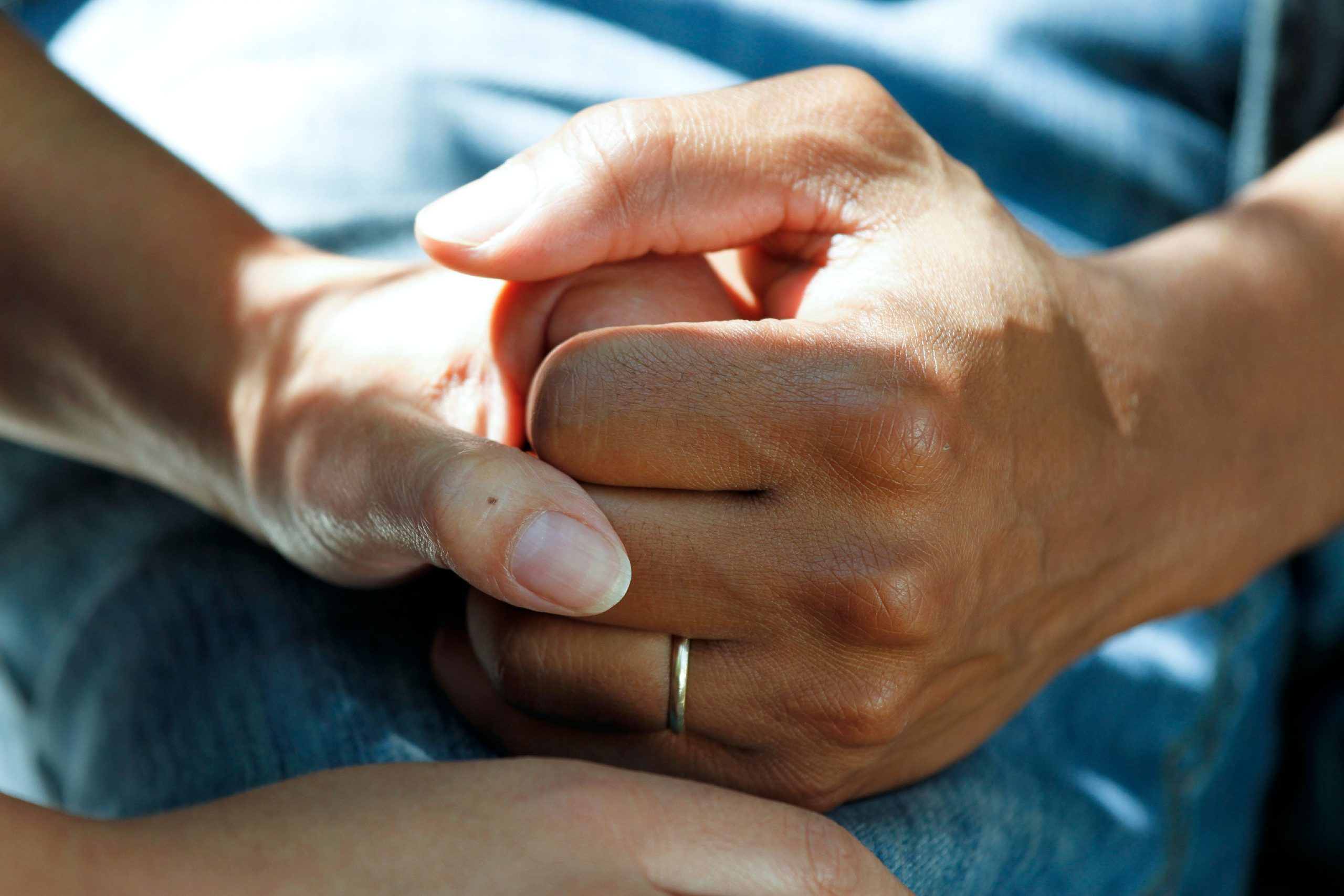 close up of two hands holding