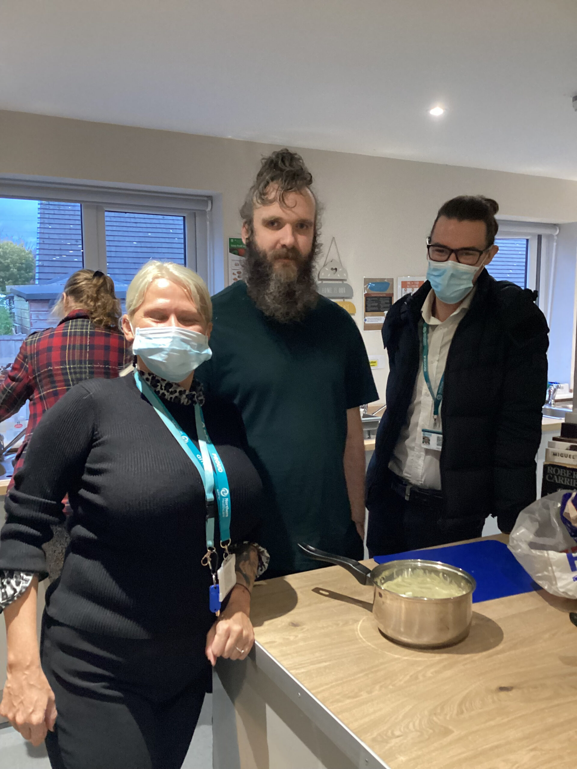 resident and team members cooking