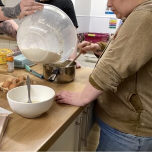 pouring the mix into the baking tin!