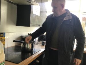 resident making porridge