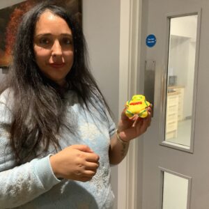 resident holding pudsey bear biscuit