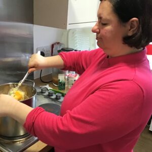 resident cooking pumpkin soup