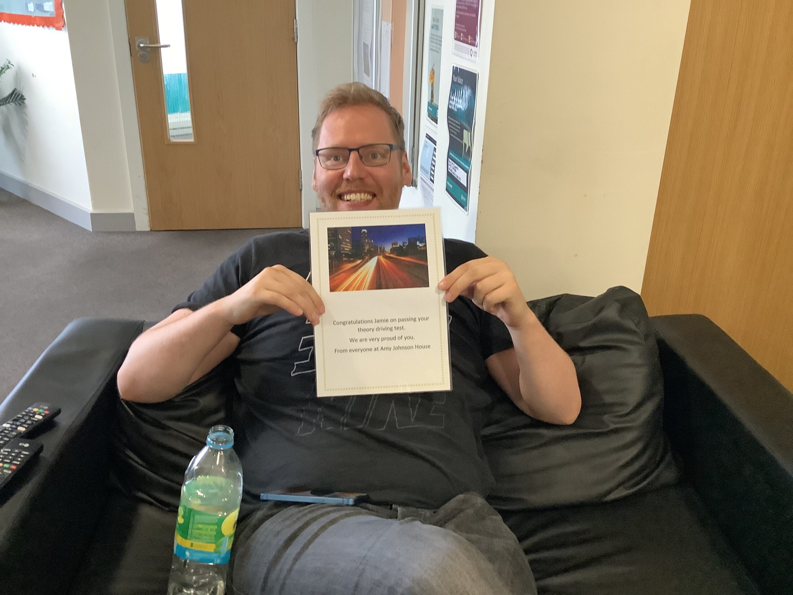 male holding certificate