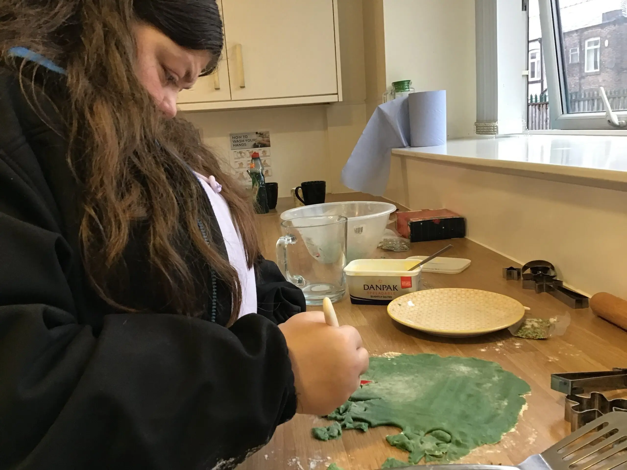 resident icing christmas biscuits