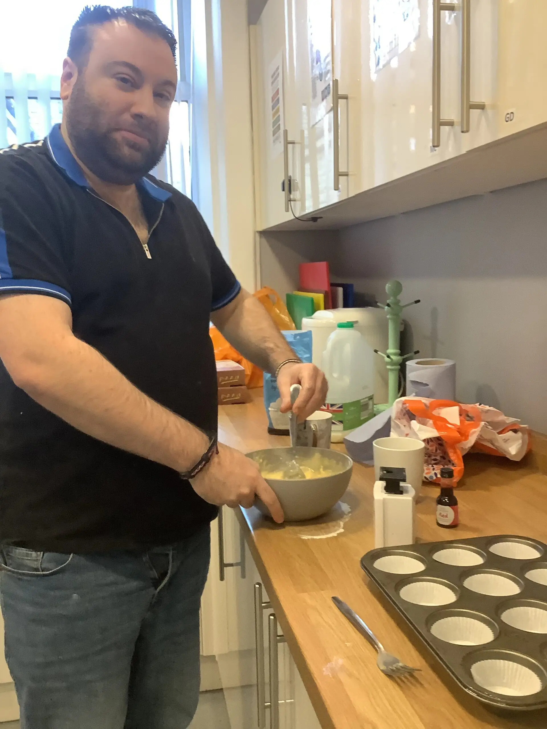 resident making cupcake mix