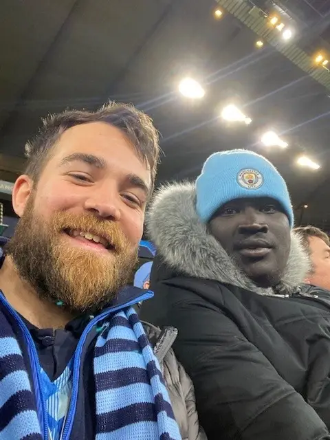 residents and support worker at Man City game