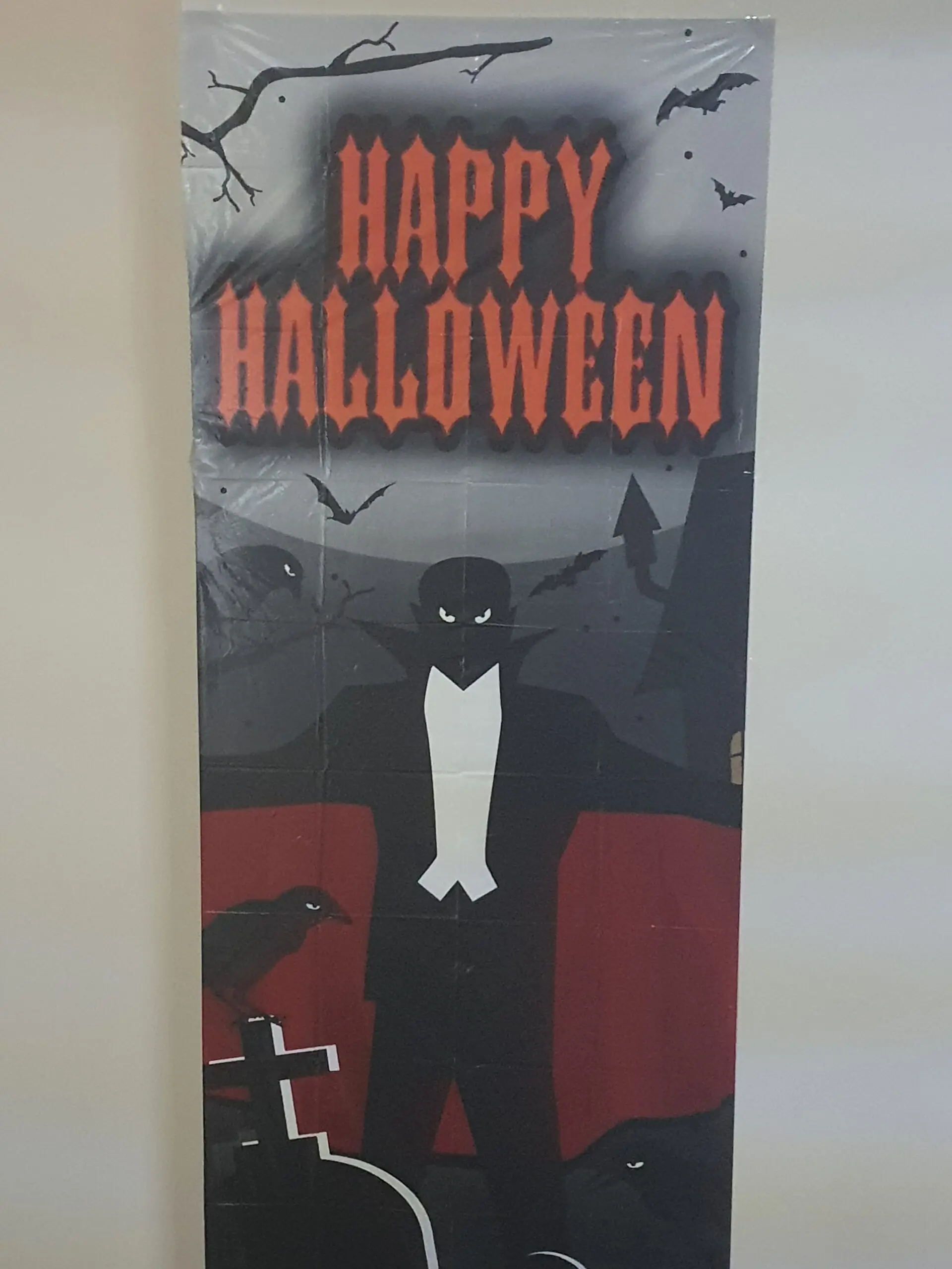 Radcliffe House Halloween decorations: Happy Halloween poster with a vampire