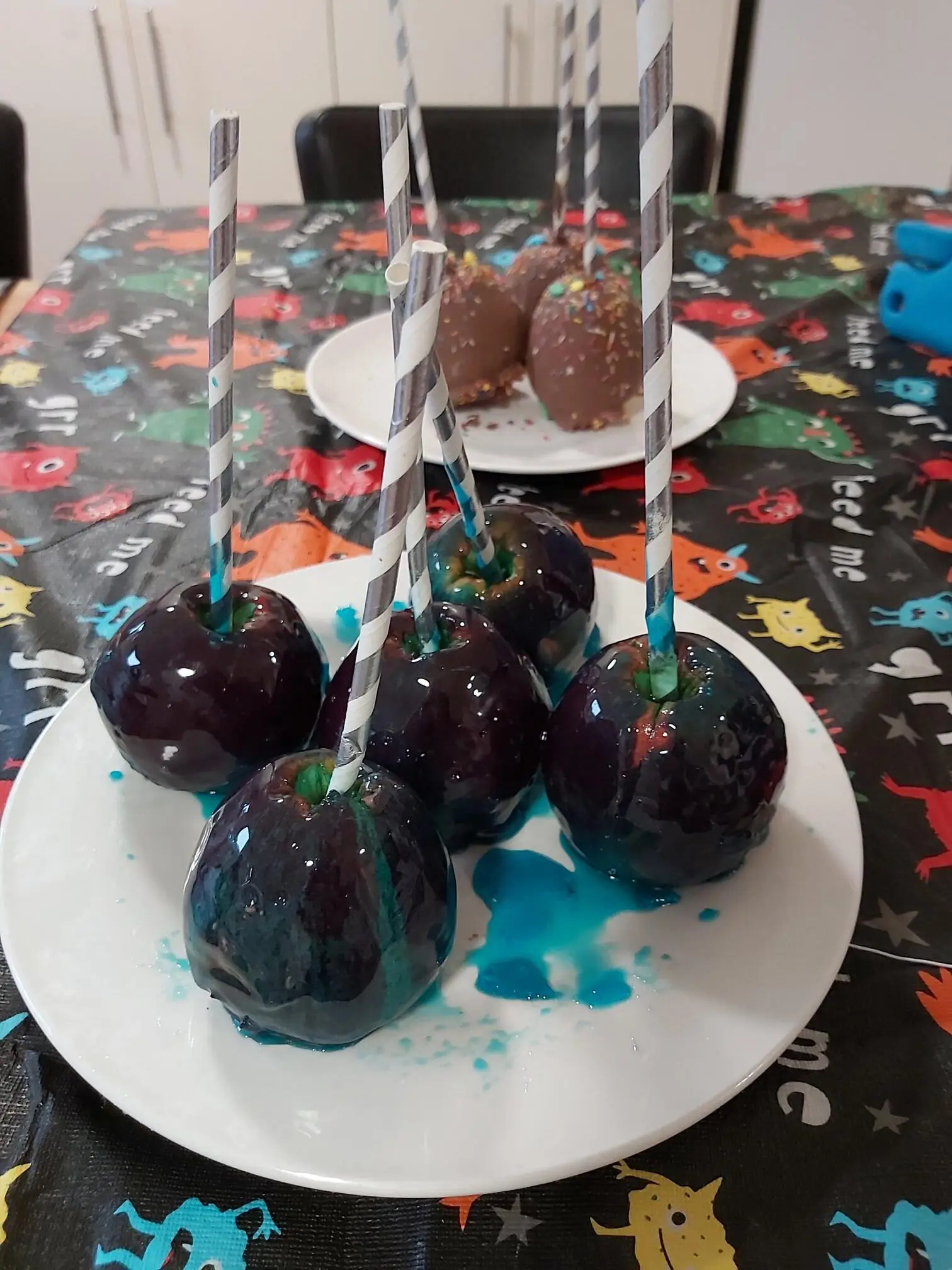 Toffee apples with blue food colouring