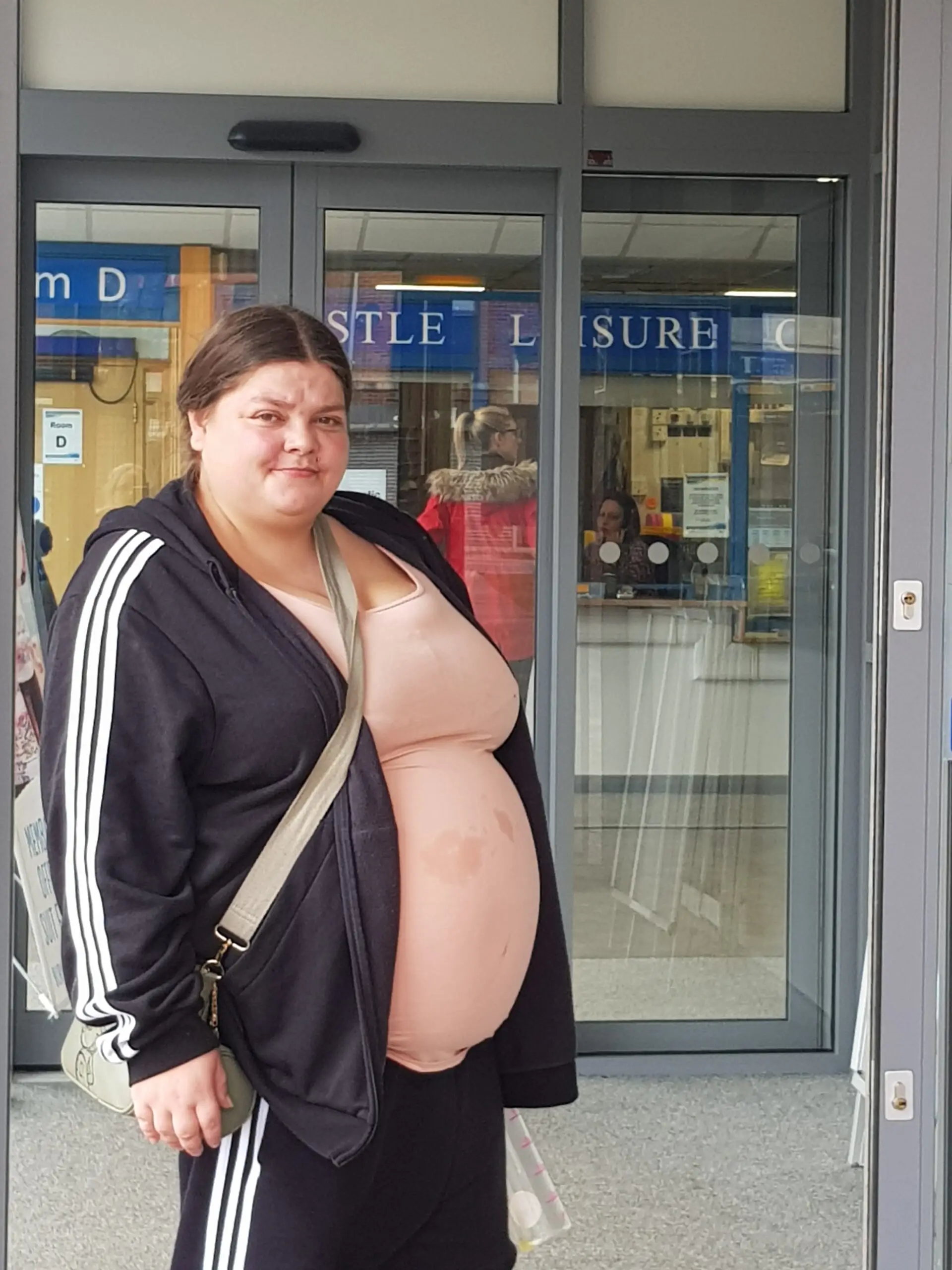 female resident outside local leisure centre