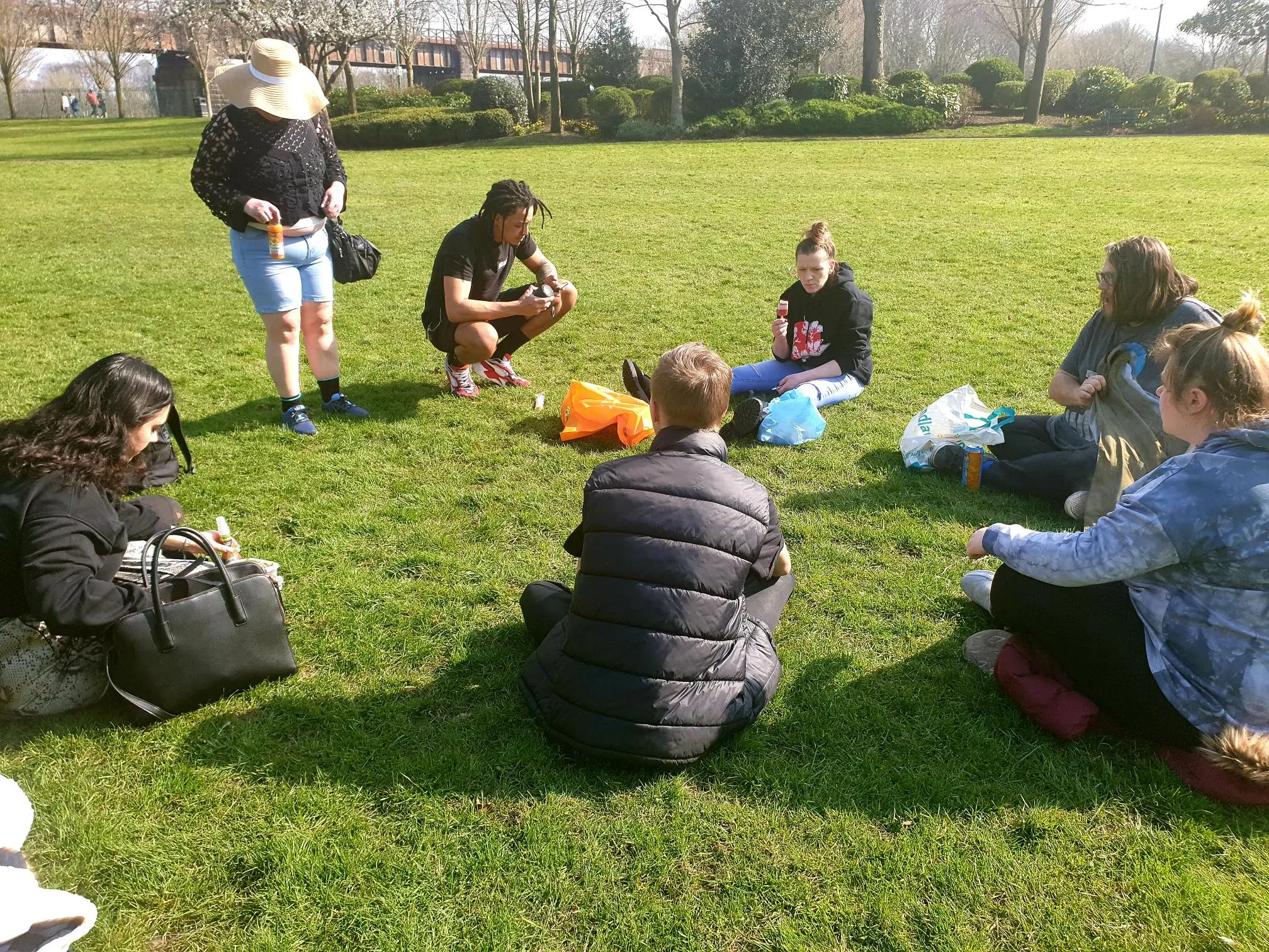 residents enjoying a picnic in the park