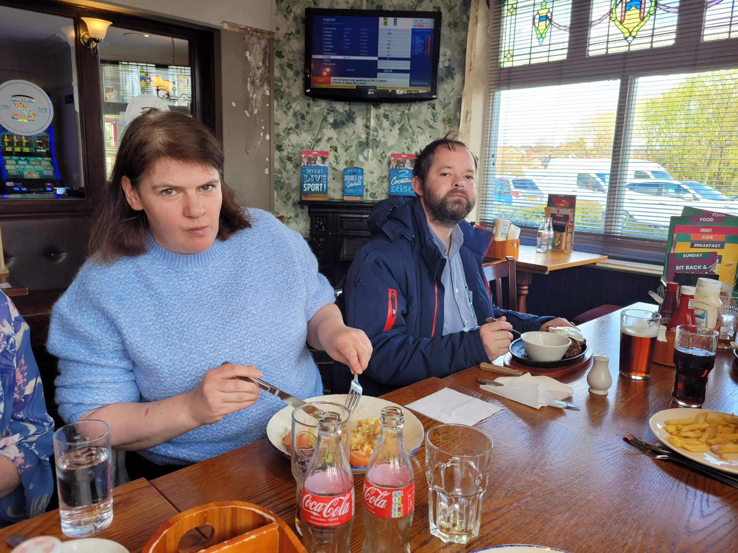 male and female enjoying pub lunch
