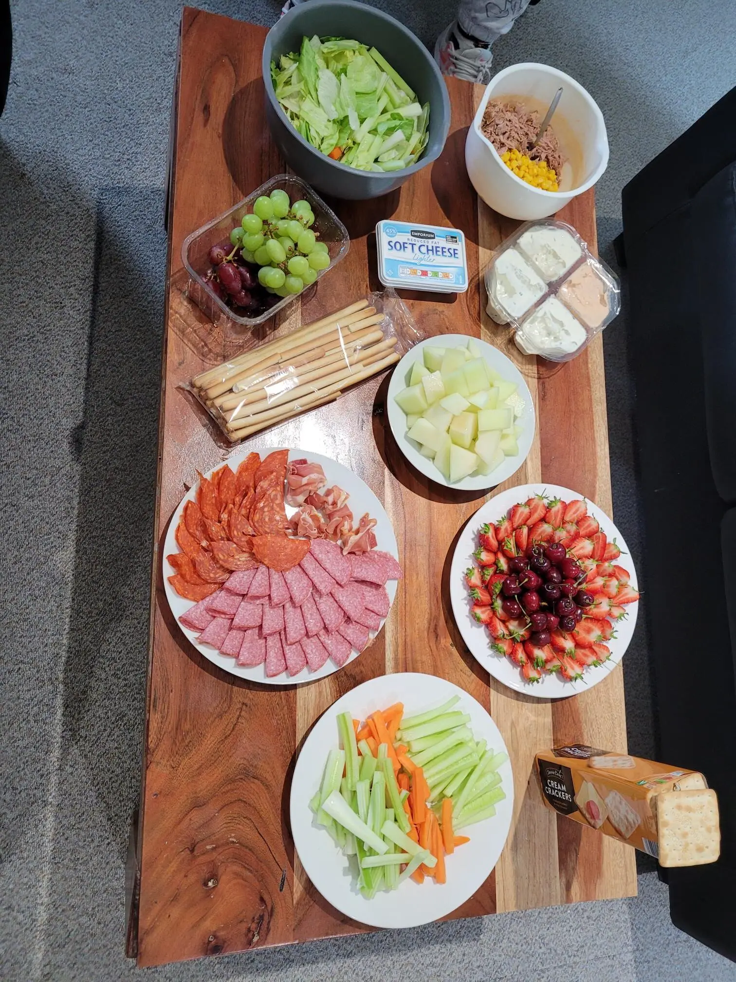 plates of food on wooden table