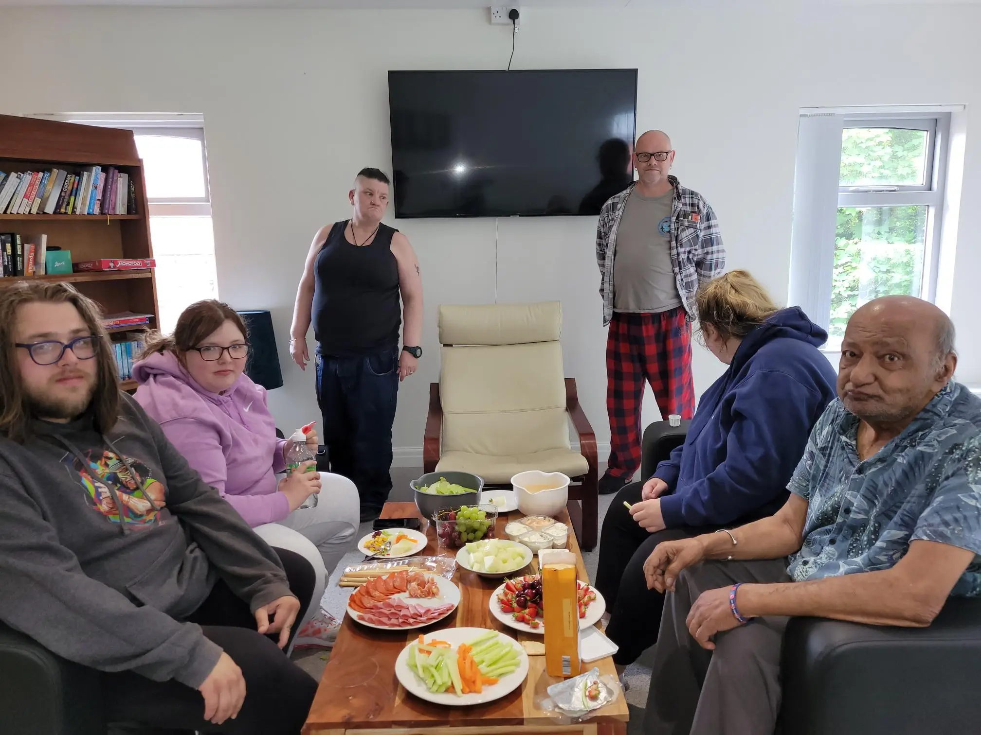 group of people around picnic table
