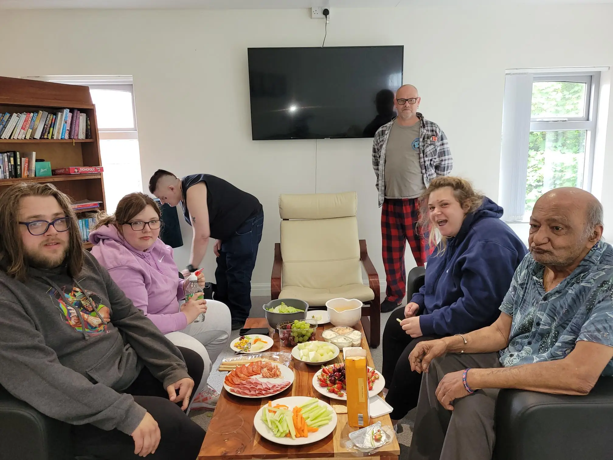 group of people around picnic table