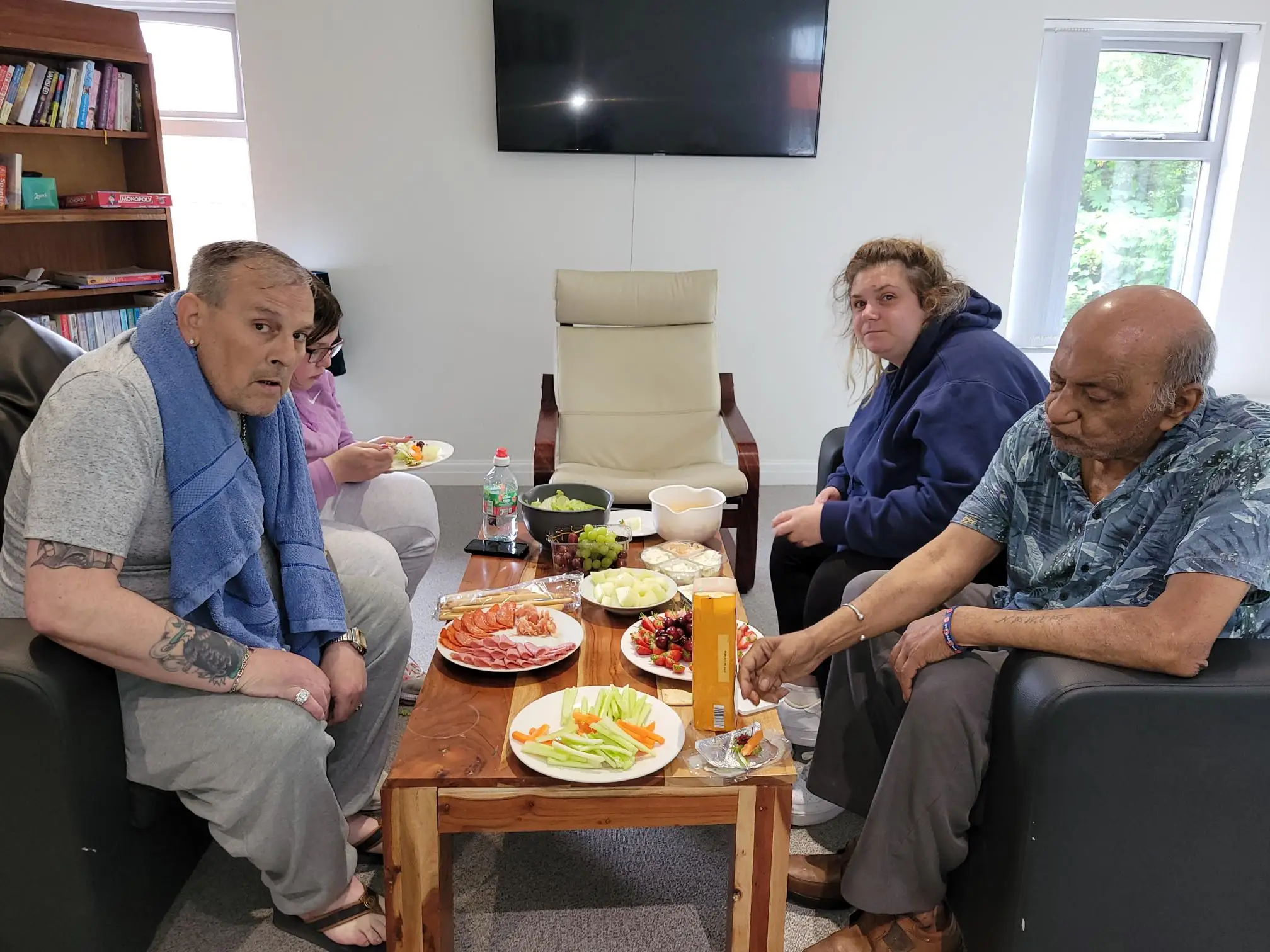 group of people around picnic table