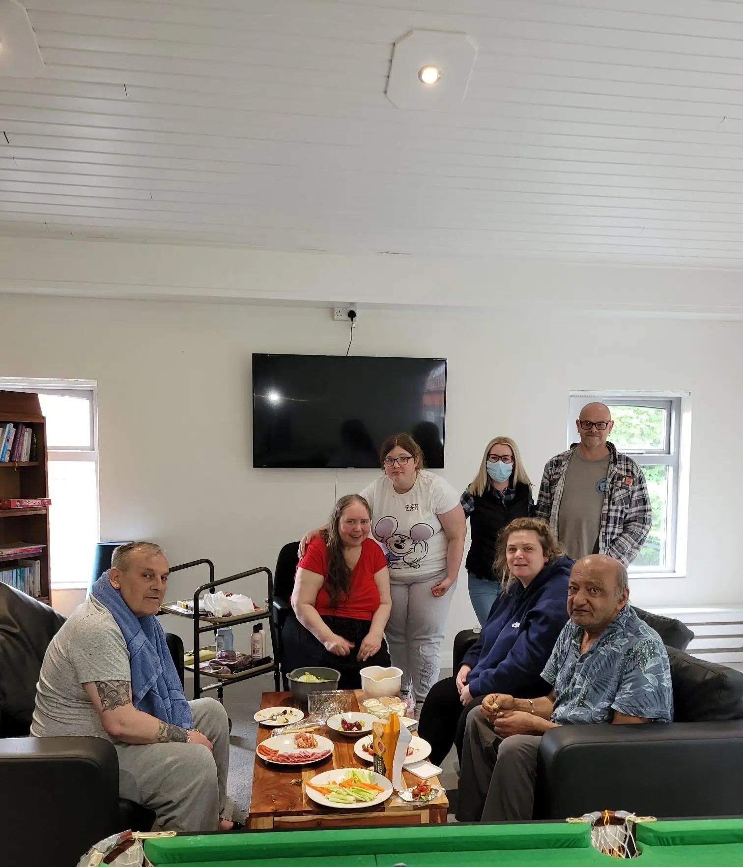 group of people around picnic table