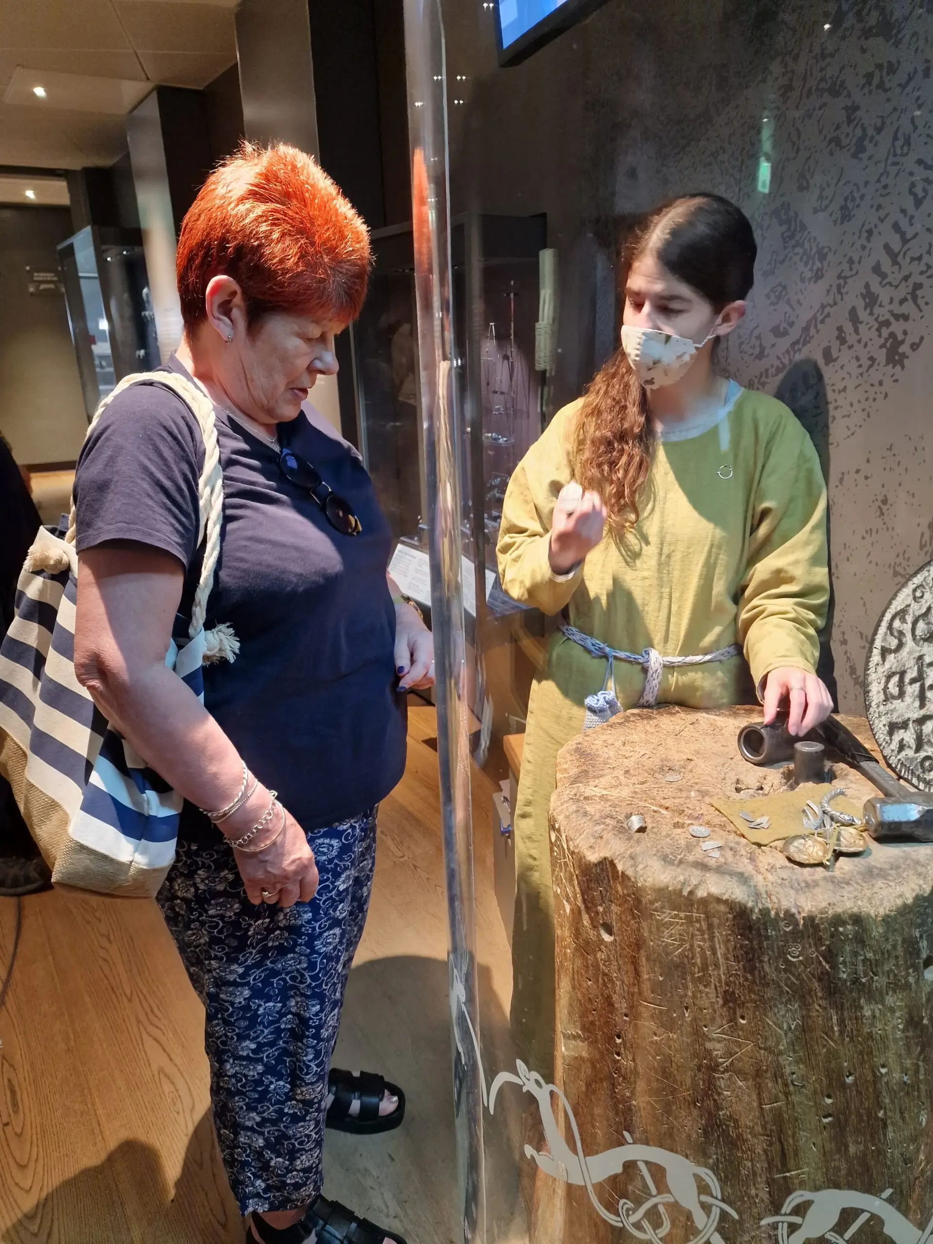 resident with staff member in museum