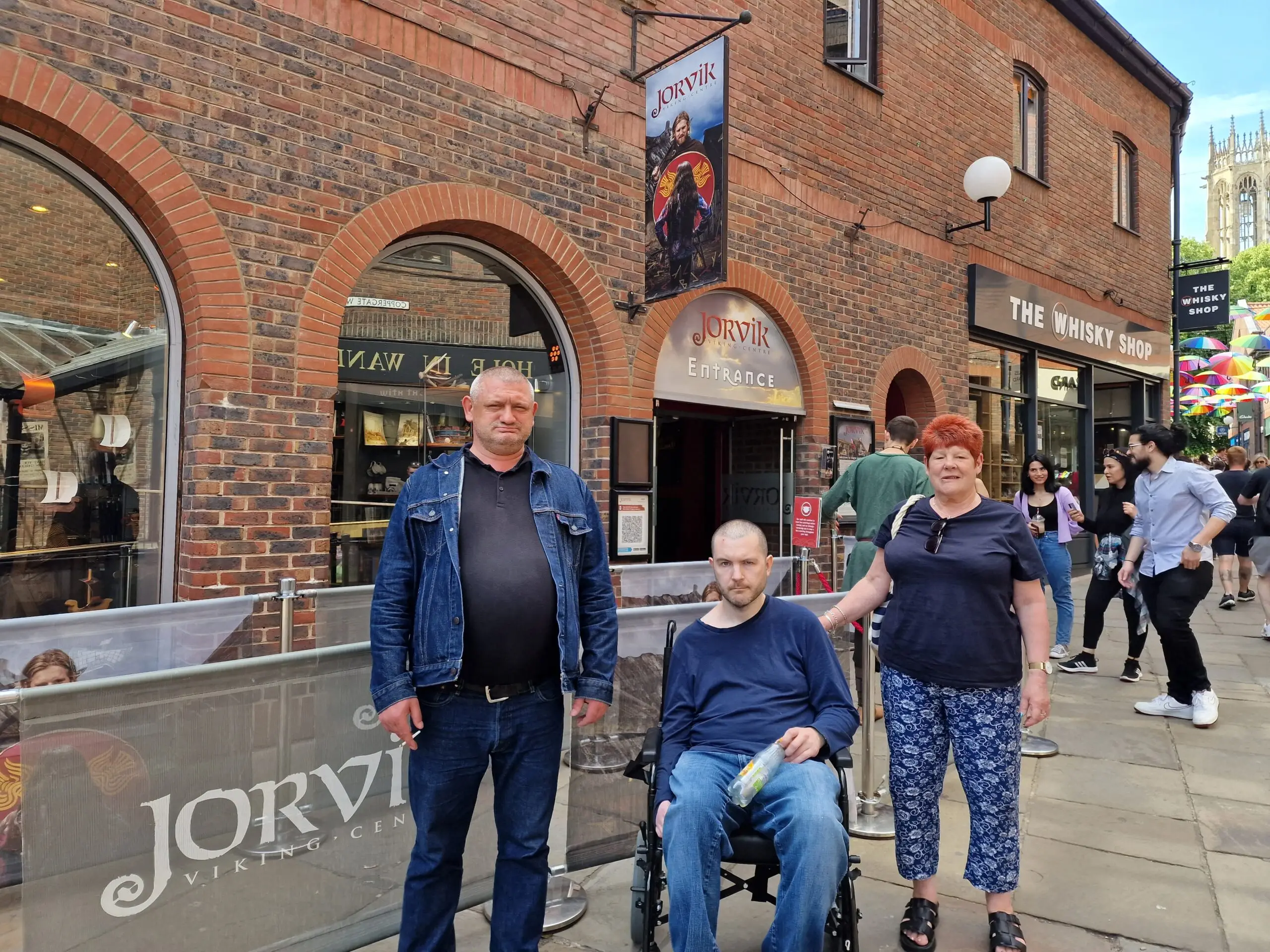 three residents outside the Jorvik museum