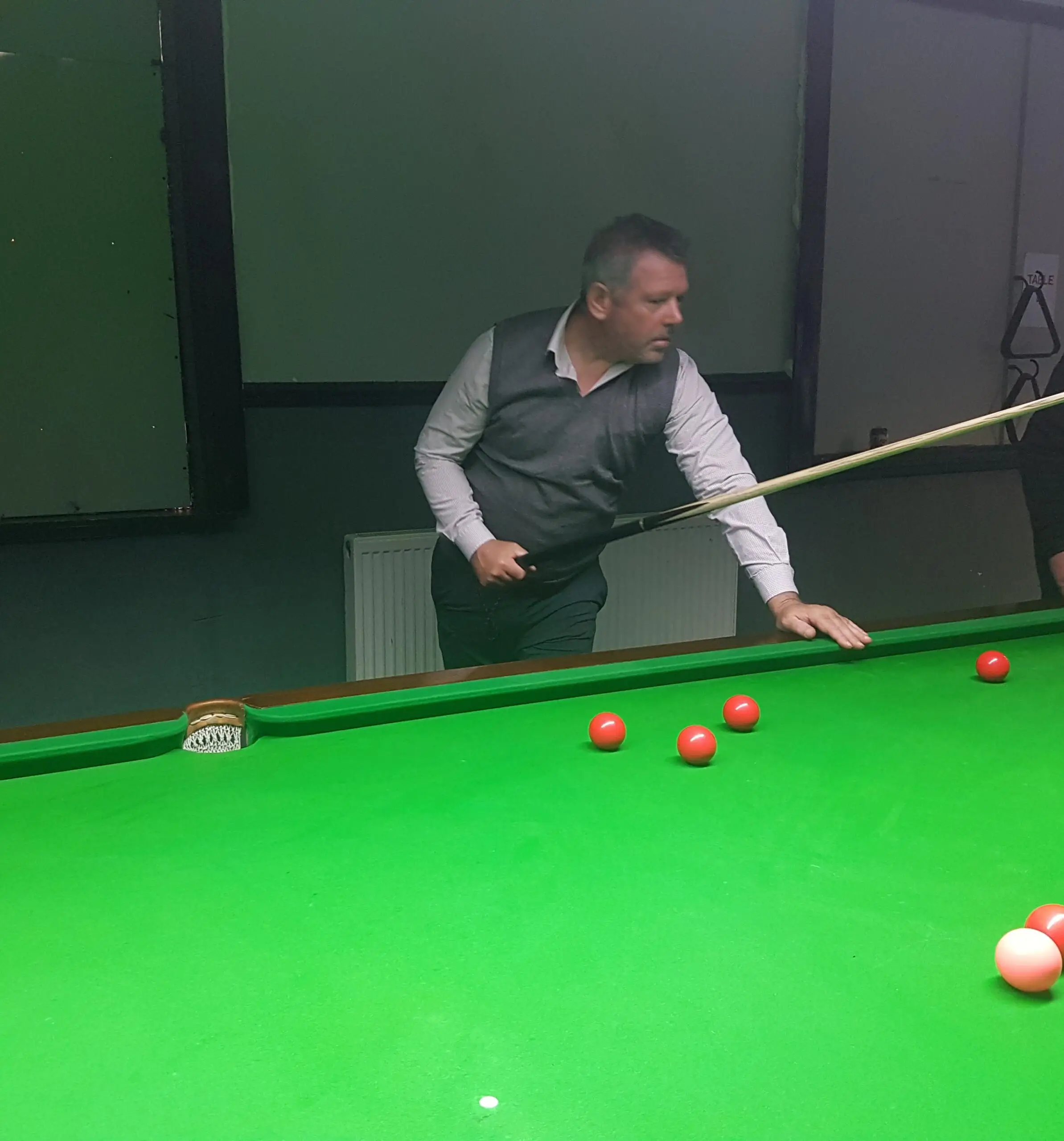 male playing snooker