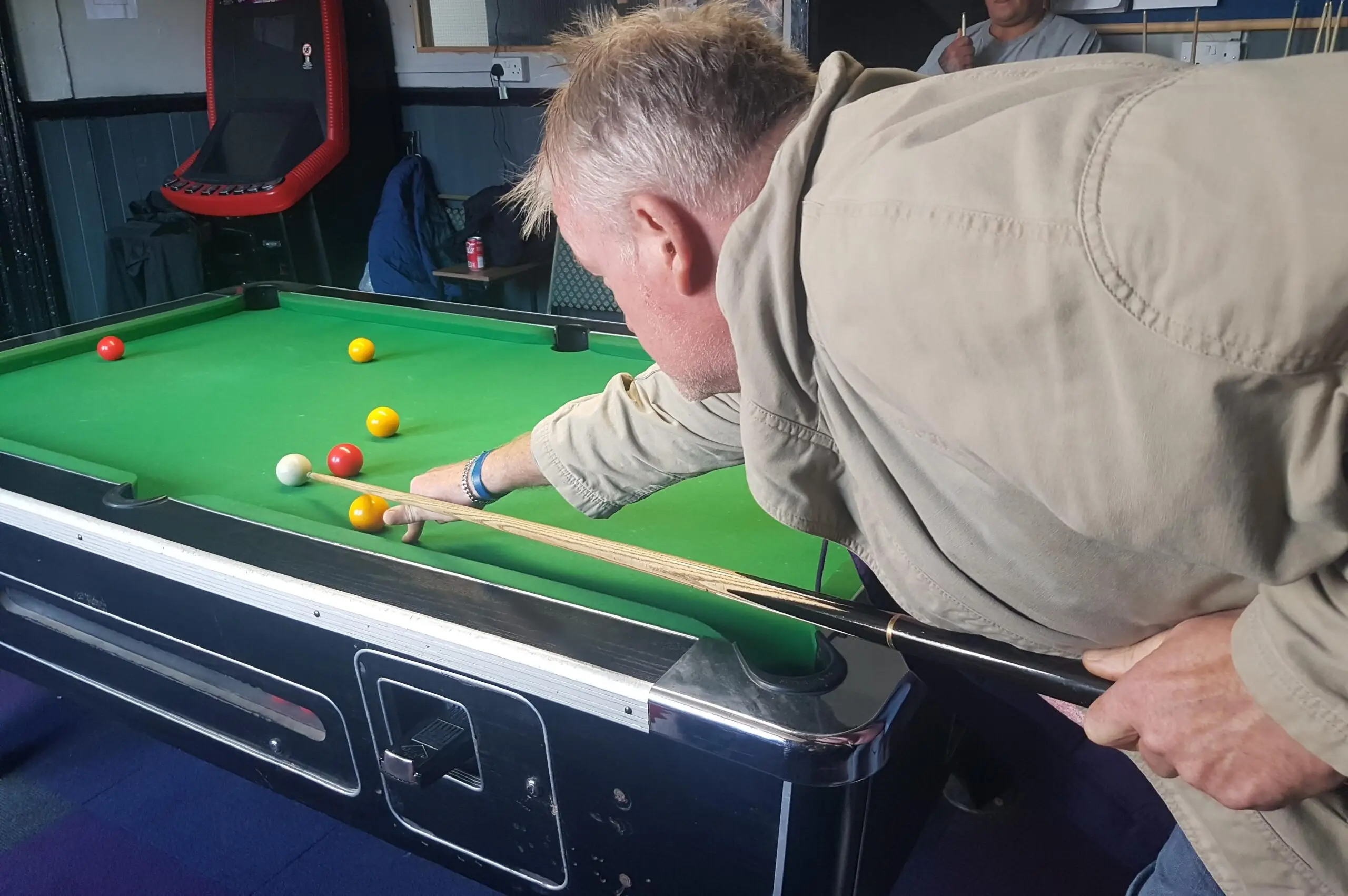 resident playing snooker