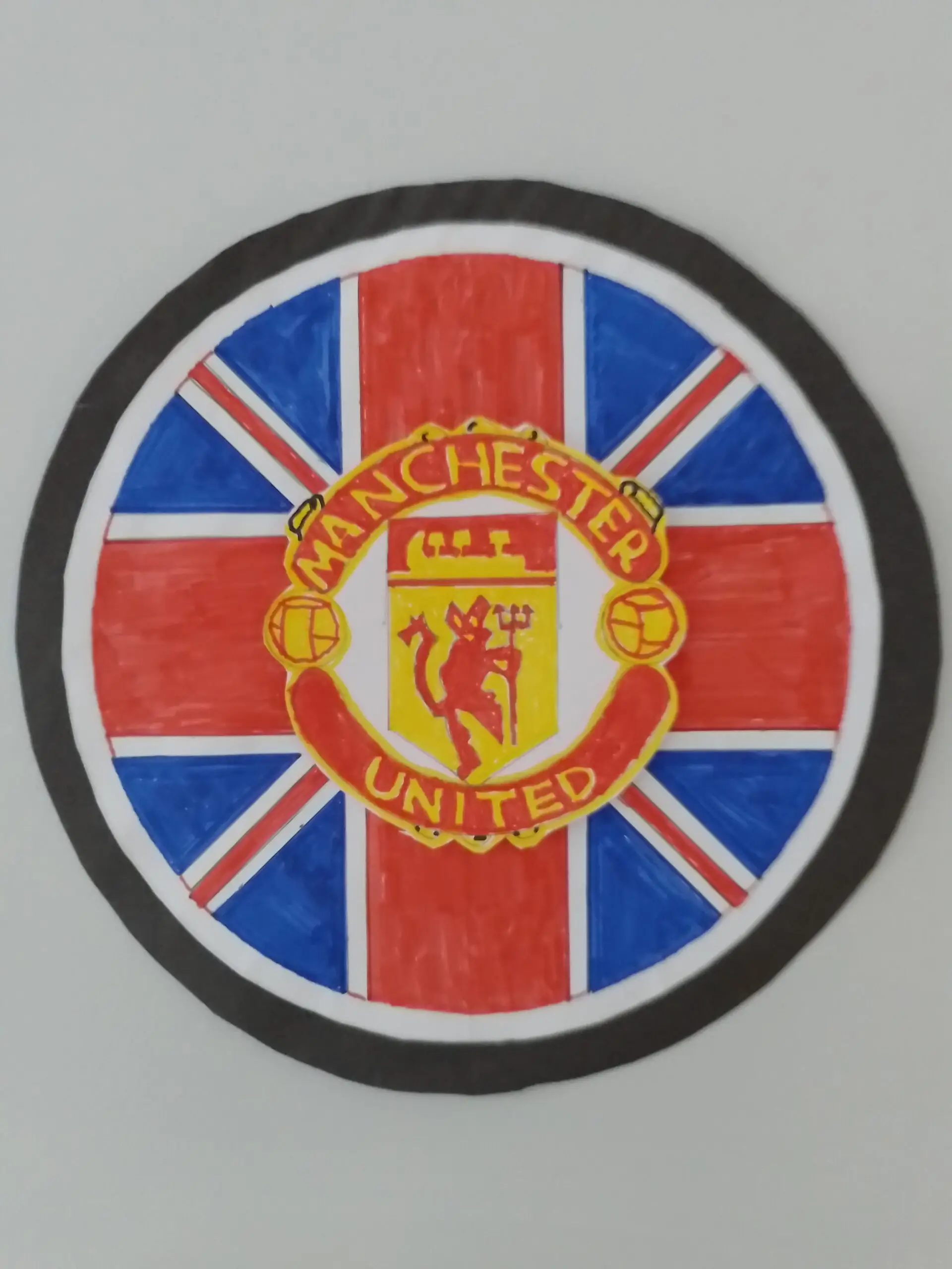 drawing of Manchester United logo