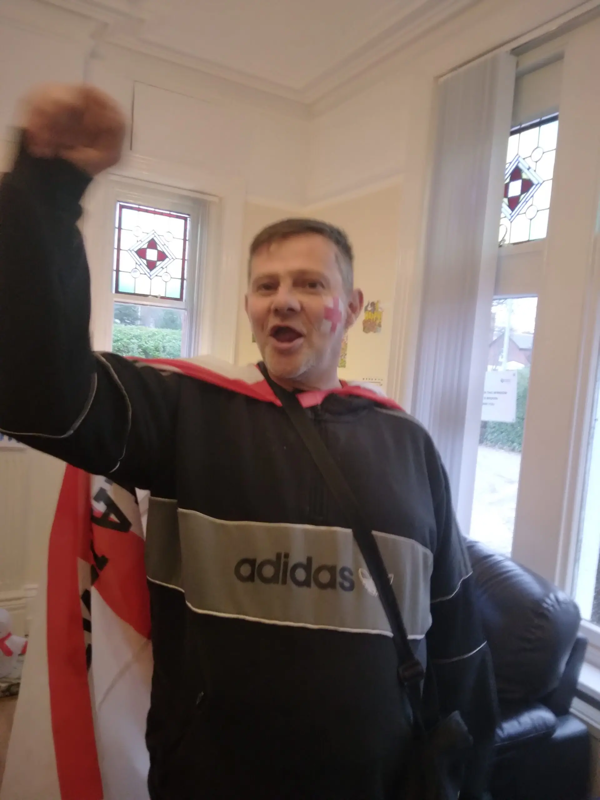 resident cheering on England in World Cup