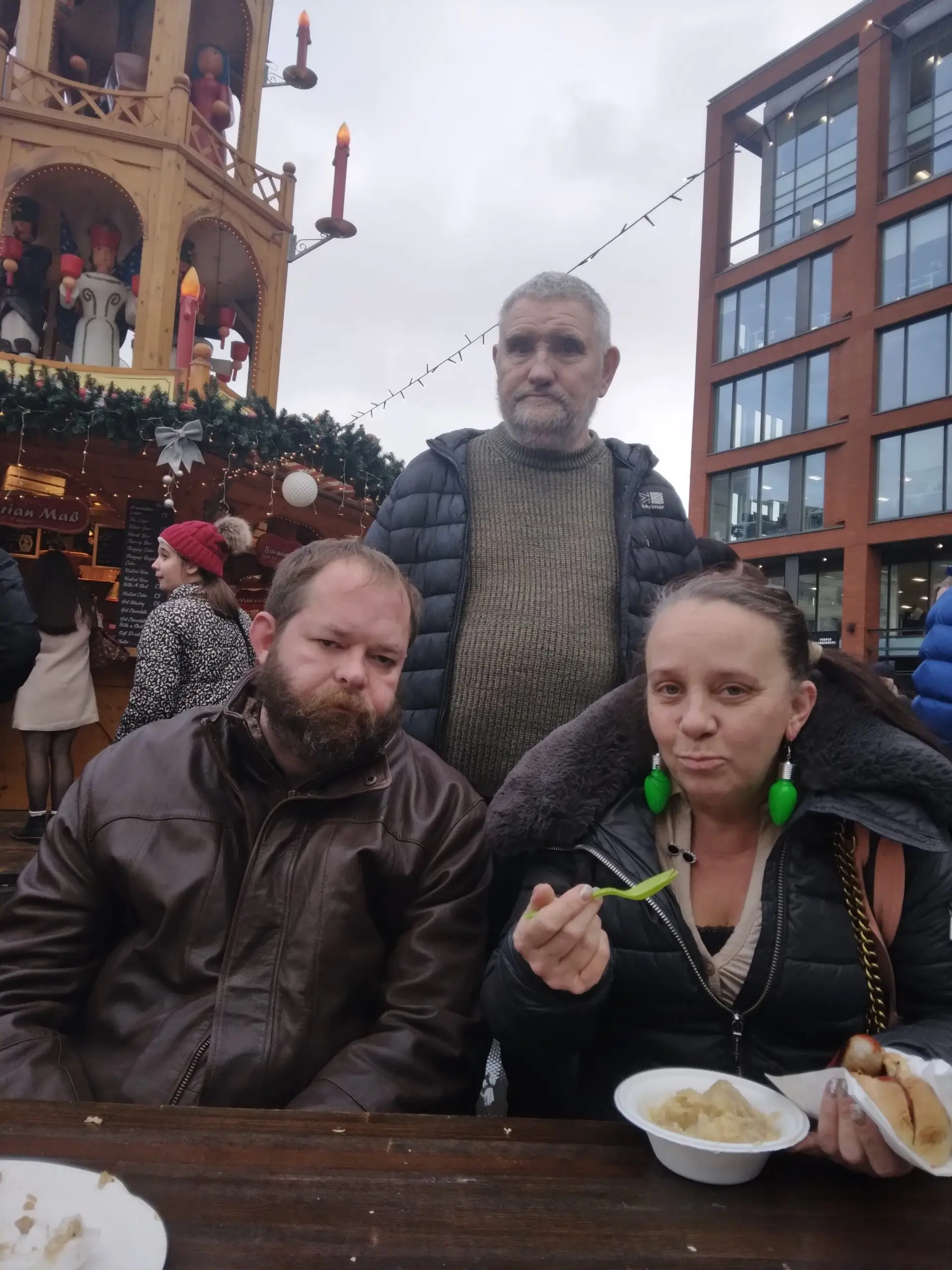 residents enjoying food at Christmas markets