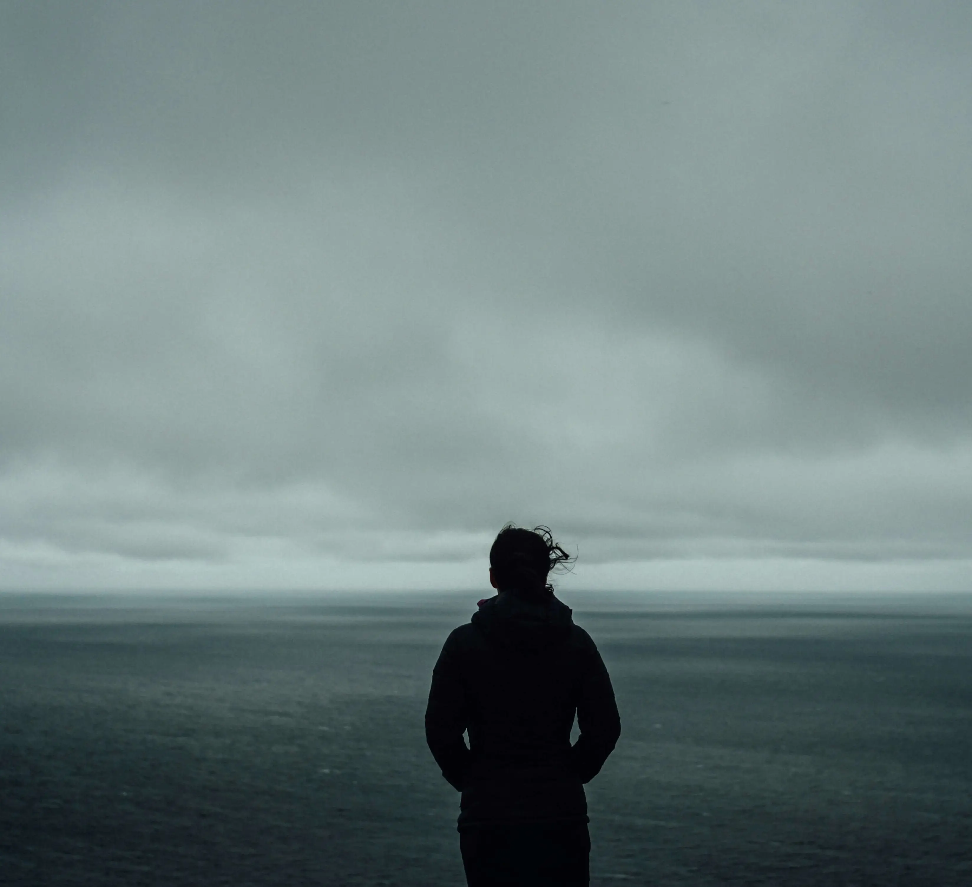 Man stood looking into distance