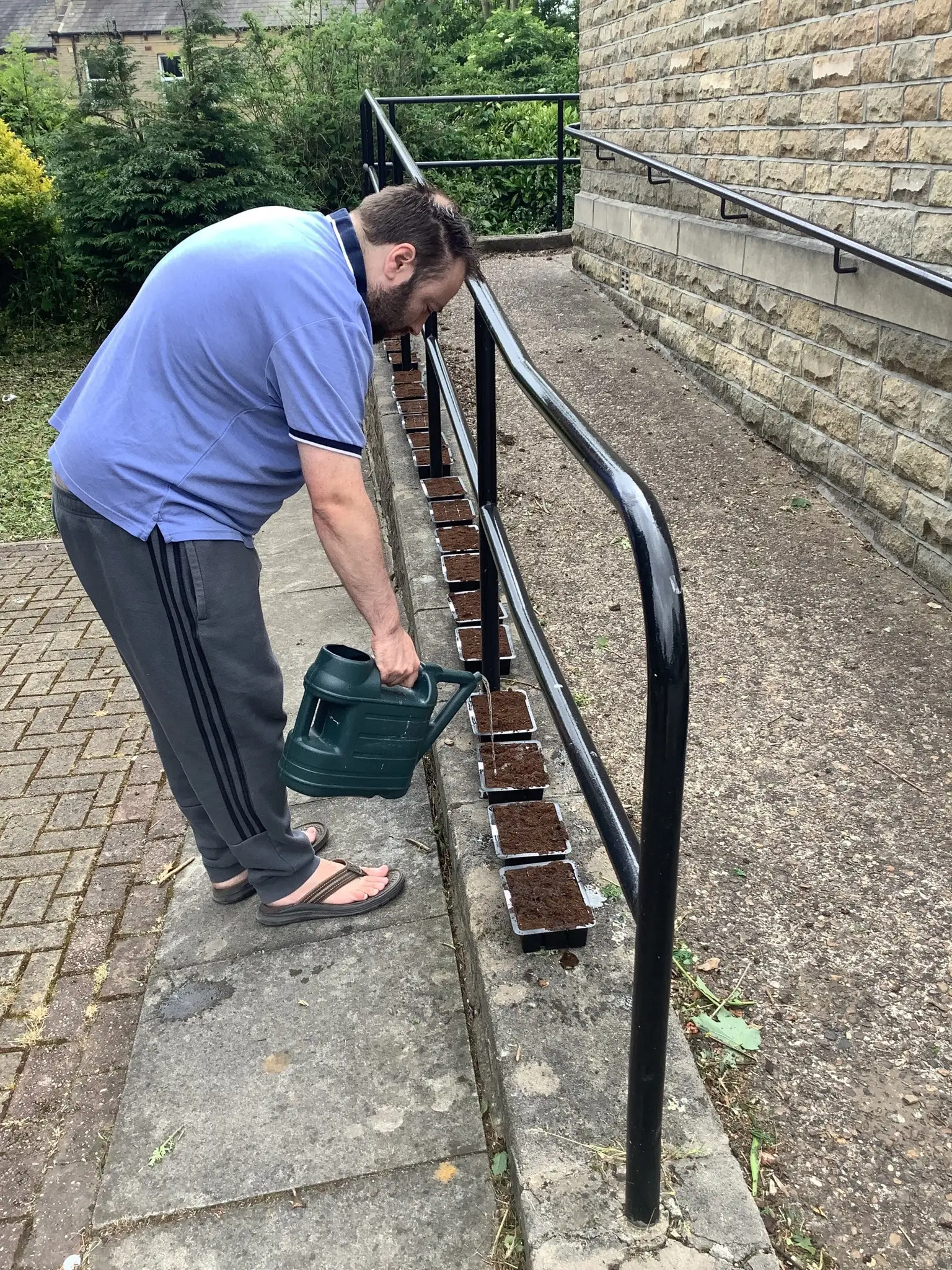 Resident gardening at Radcliffe Lodge