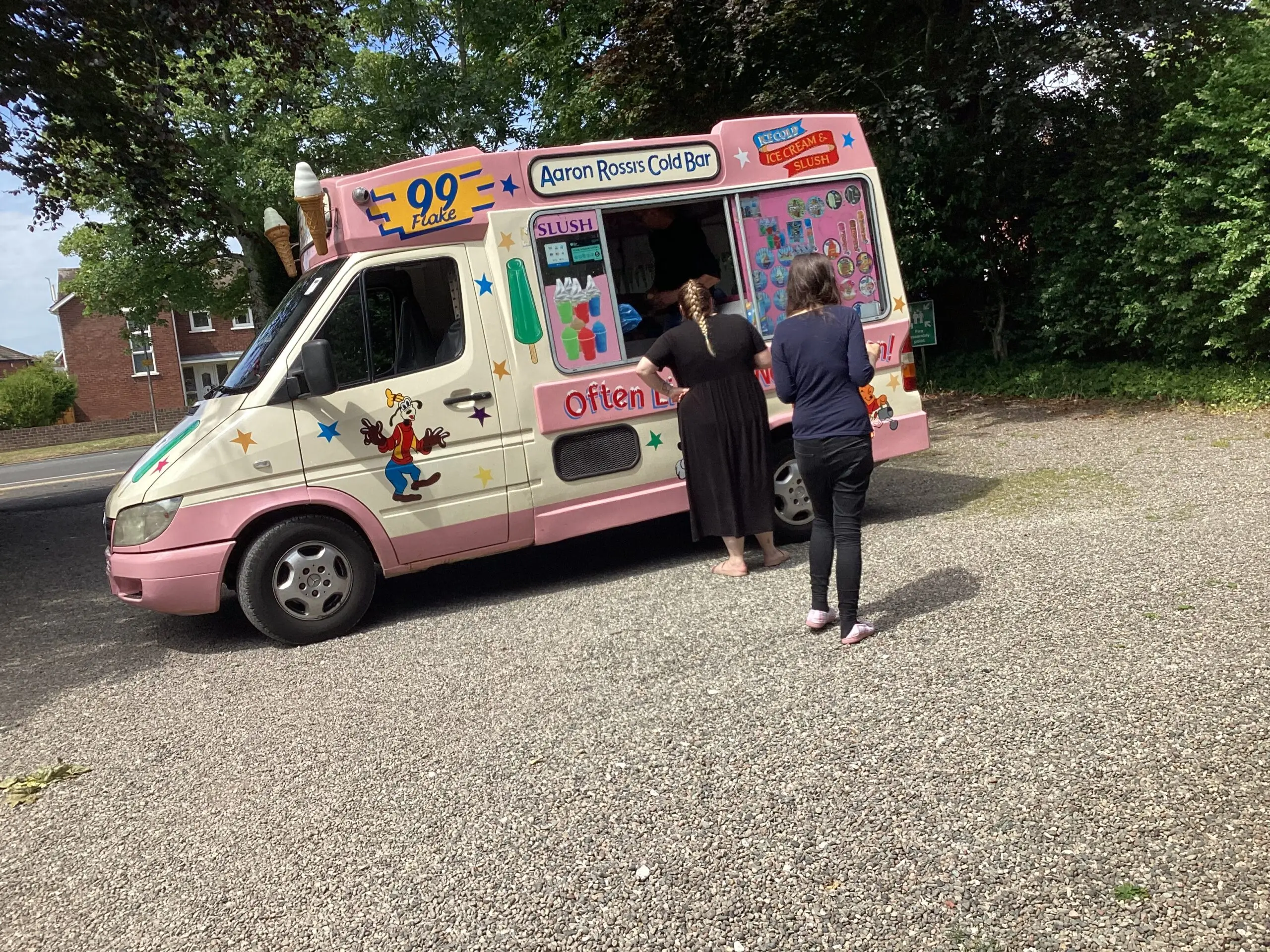 residents getting ice cream from ice cream van