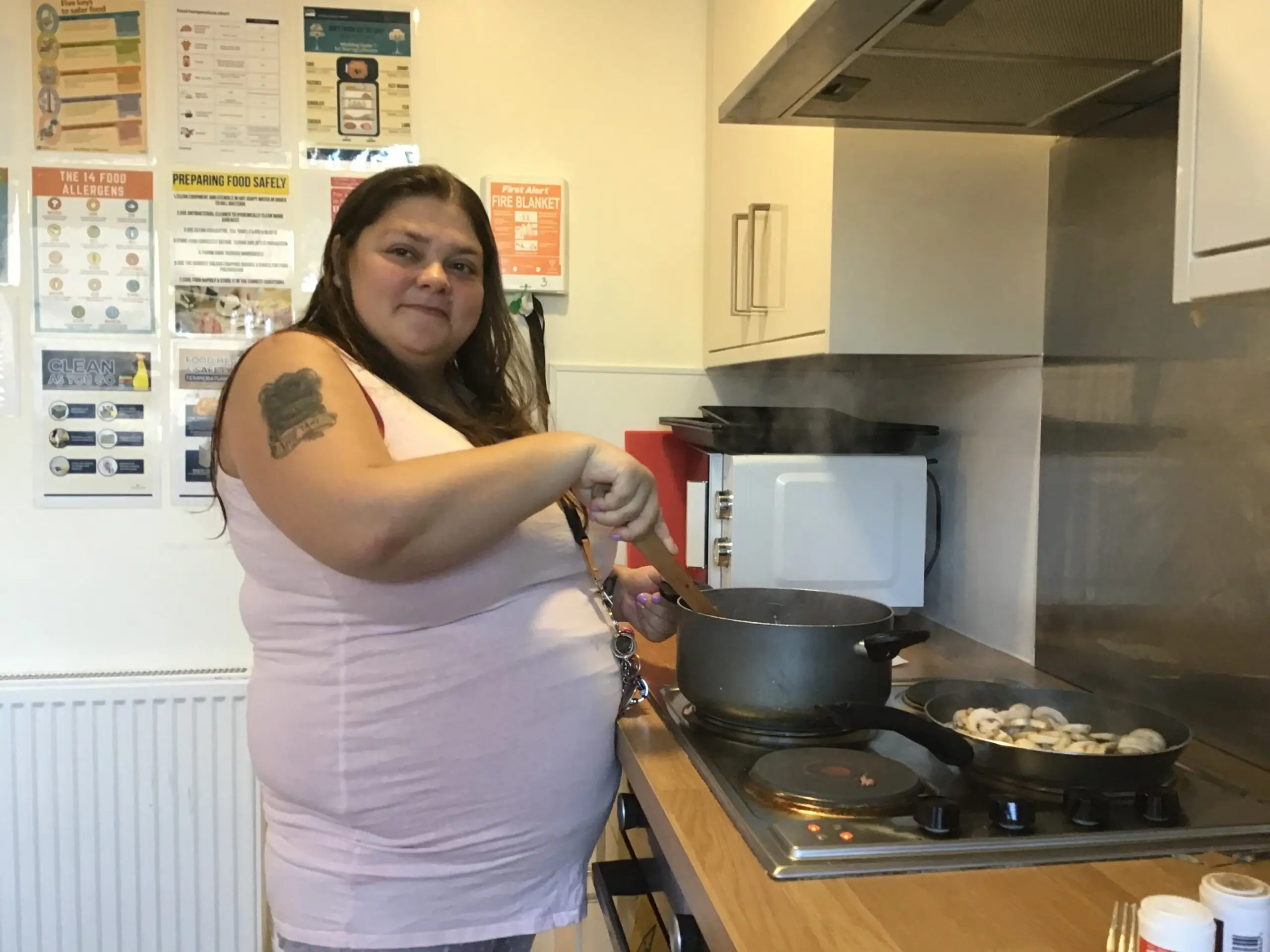 resident cooking on stove