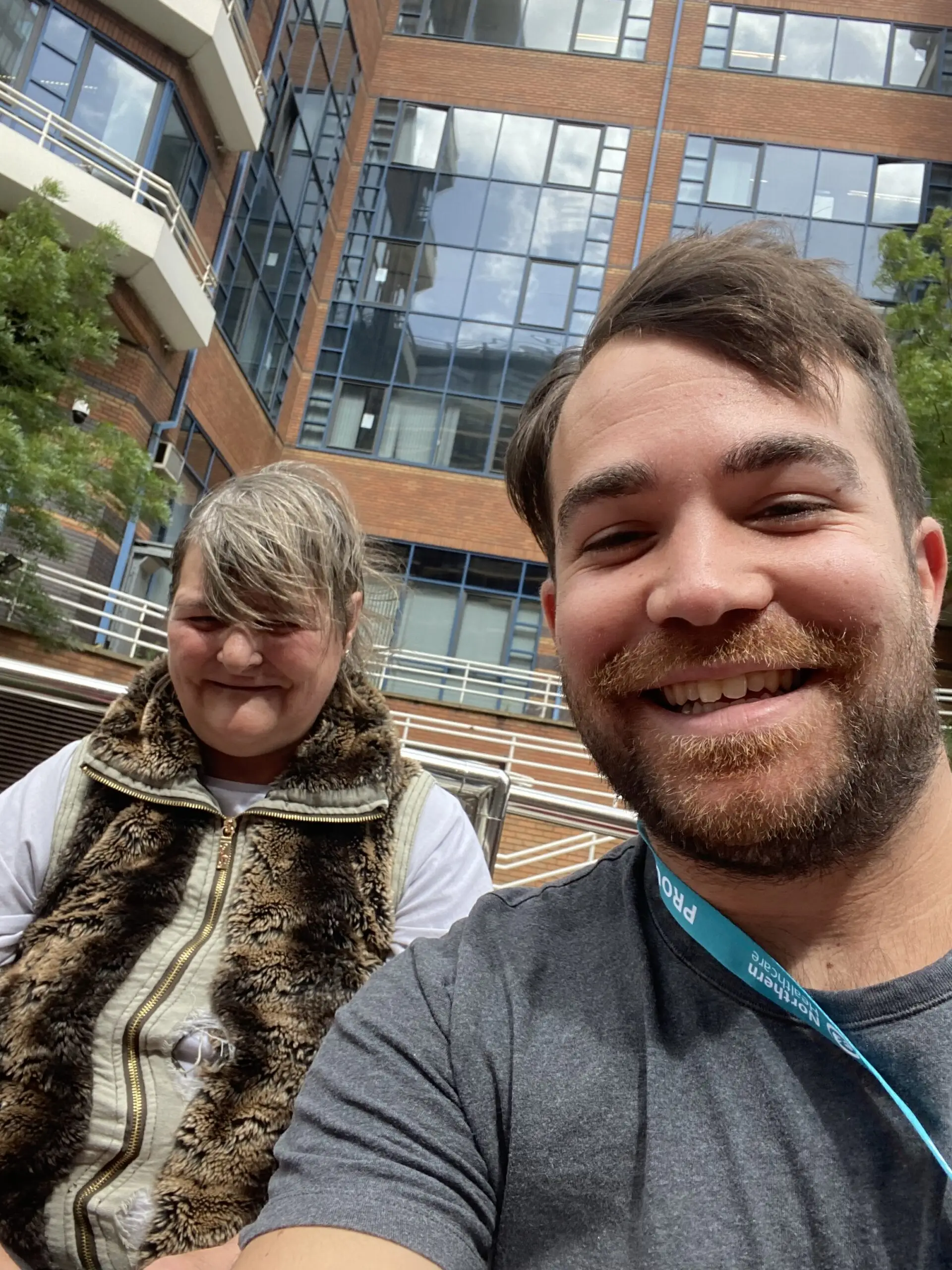 Resident and staff member on a boat