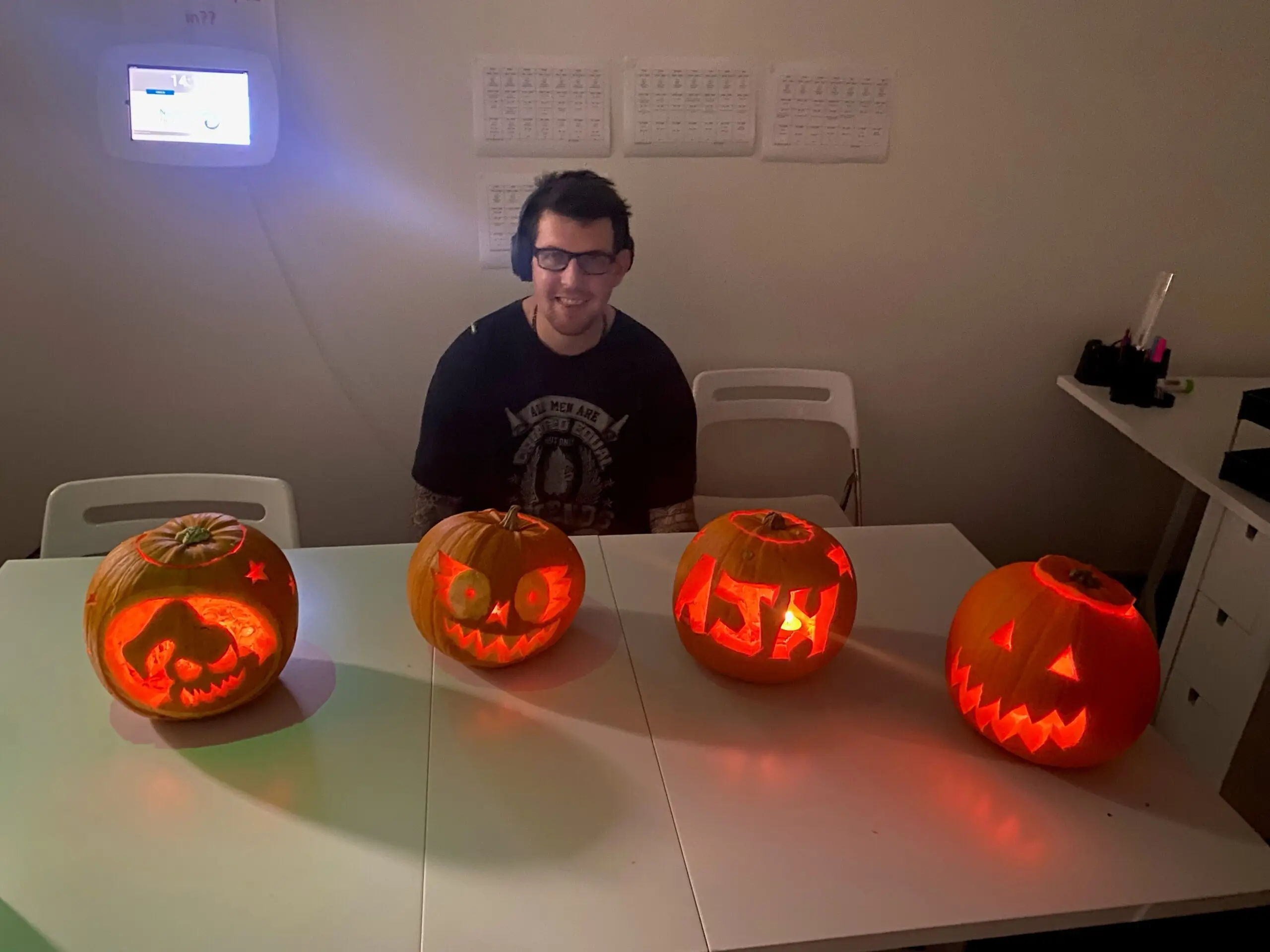 resident with pumpkins