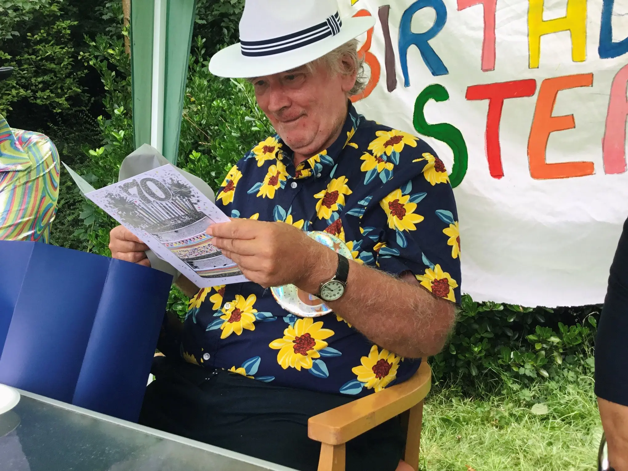 resident reading birthday card