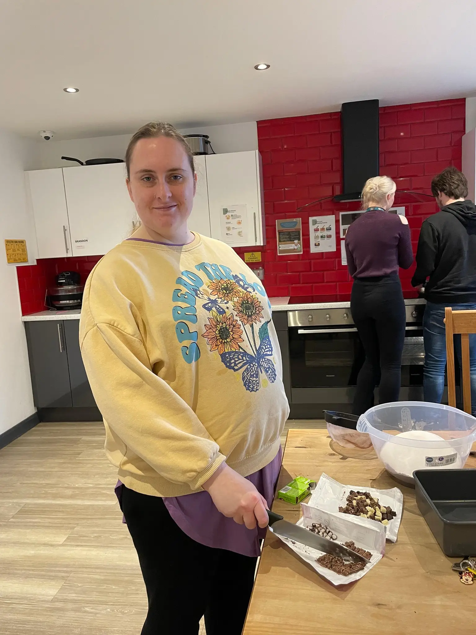 Female resident baking brownies