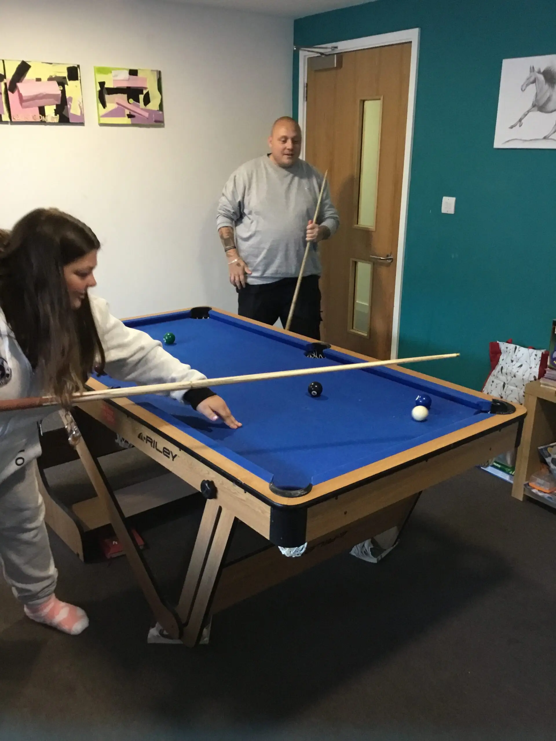 residents playing pool