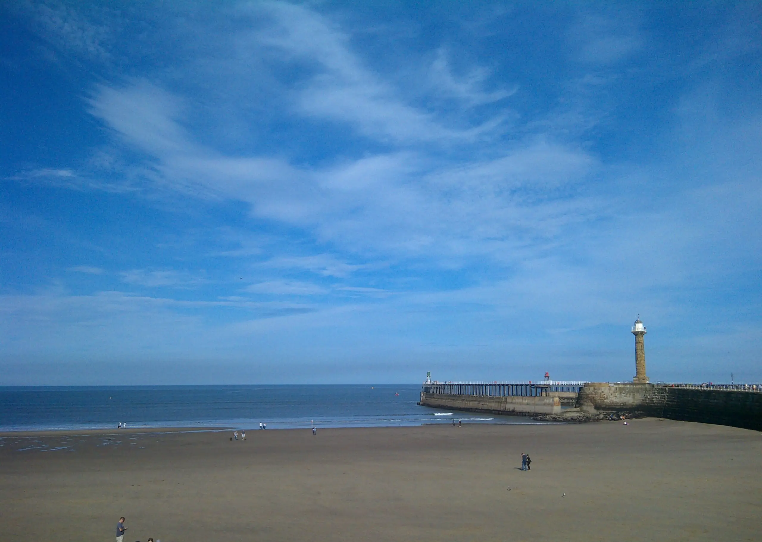 Whitby beach with blue sky