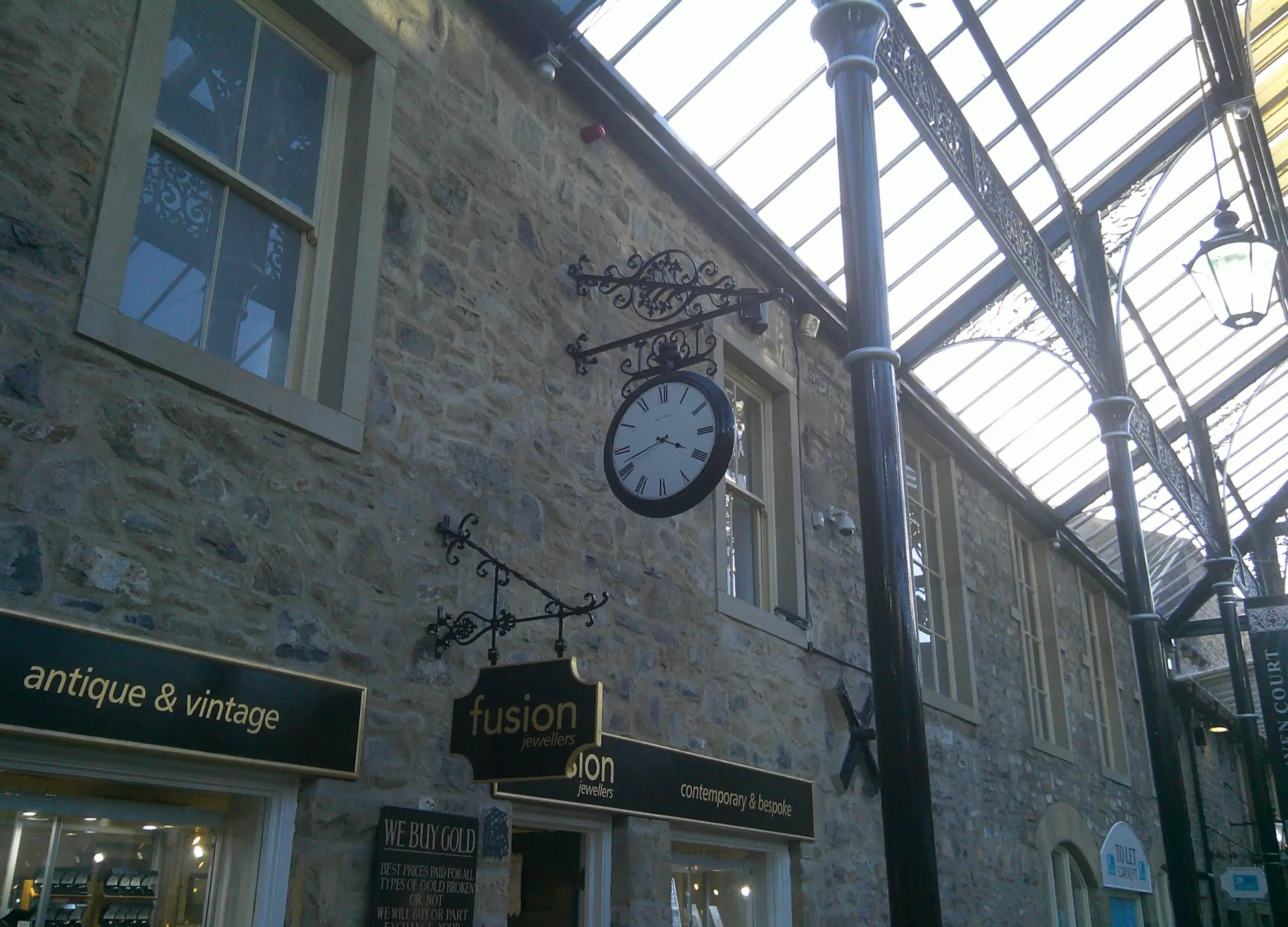 clock on old brick wall