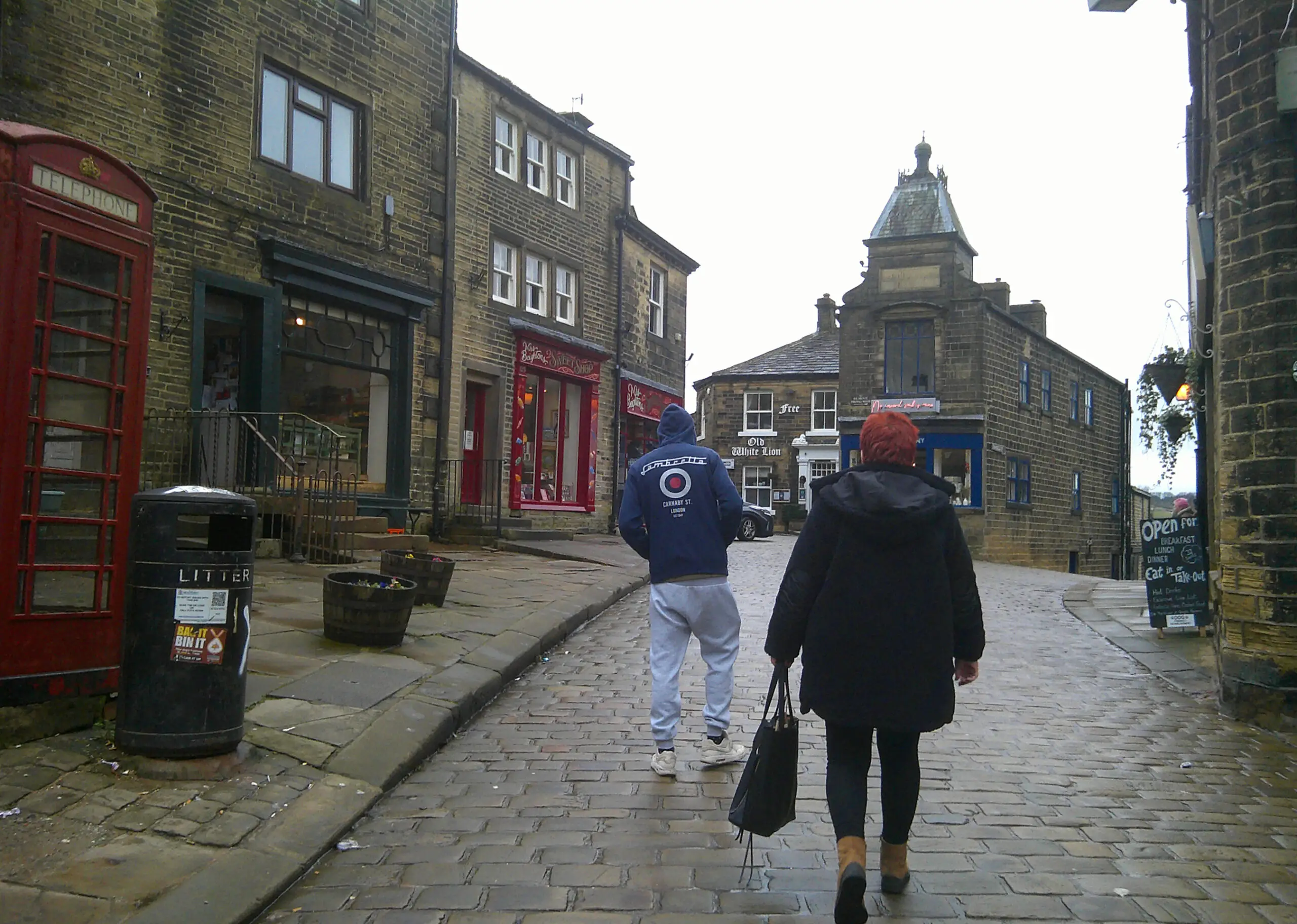 residents walking through street