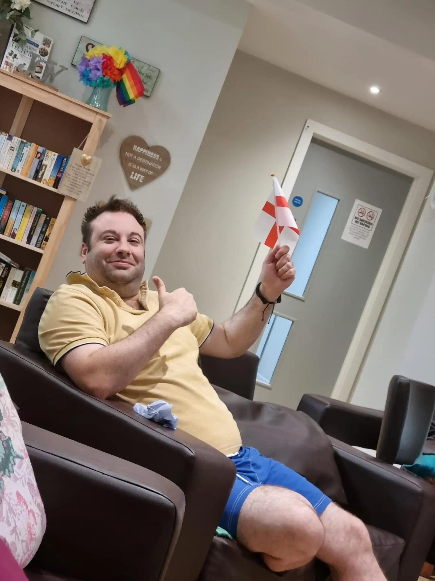 resident waving england flag