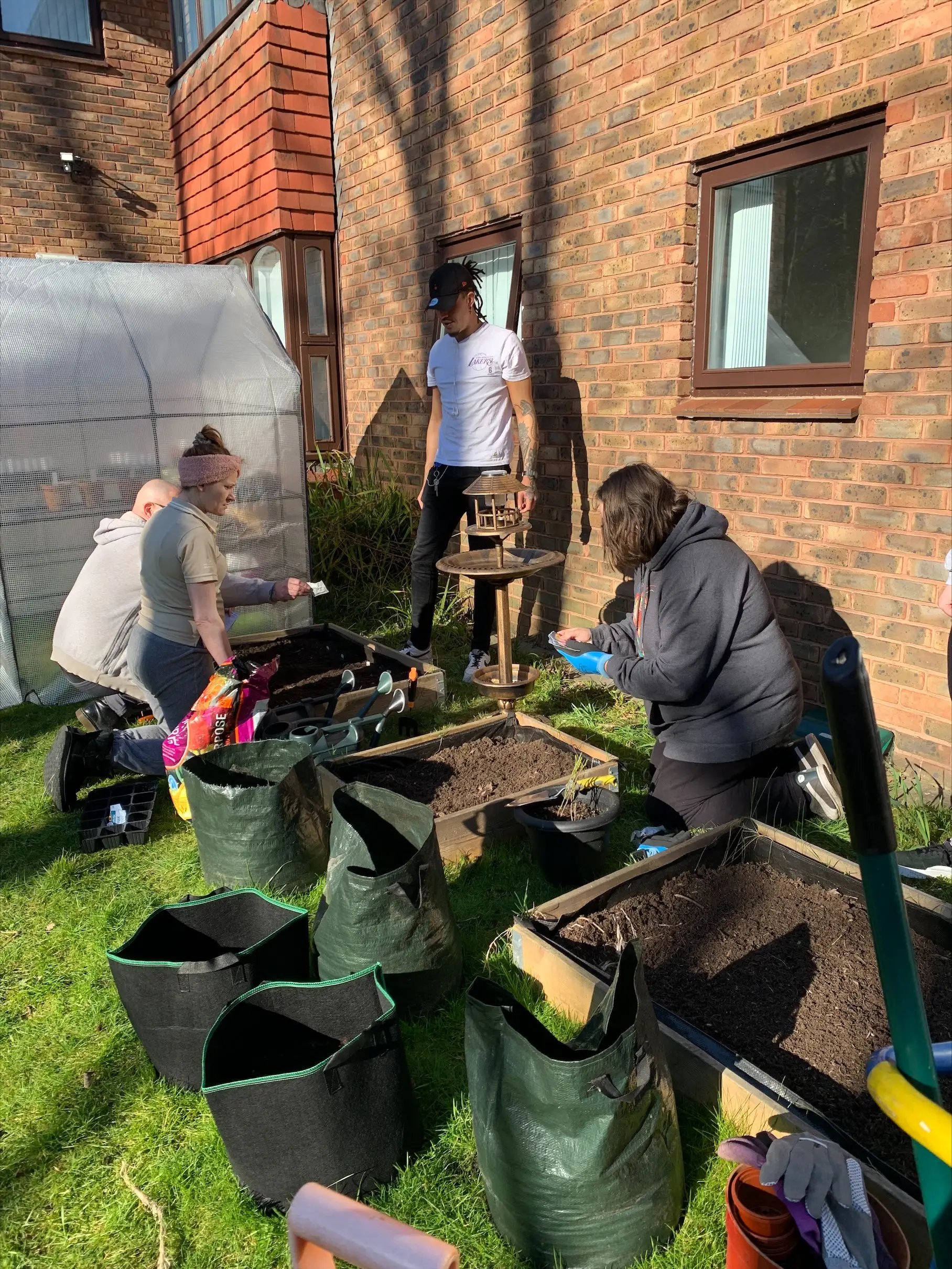residents gardening in the sun