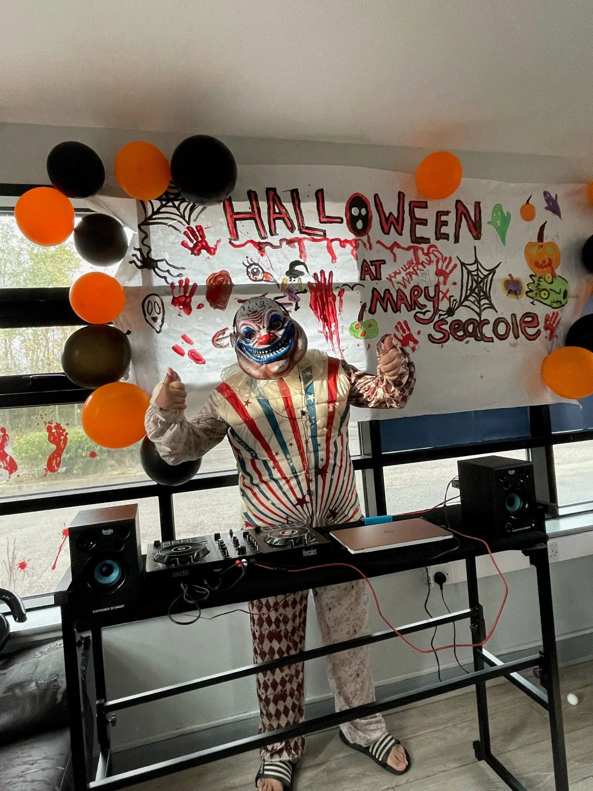 resident dressed as clown DJ