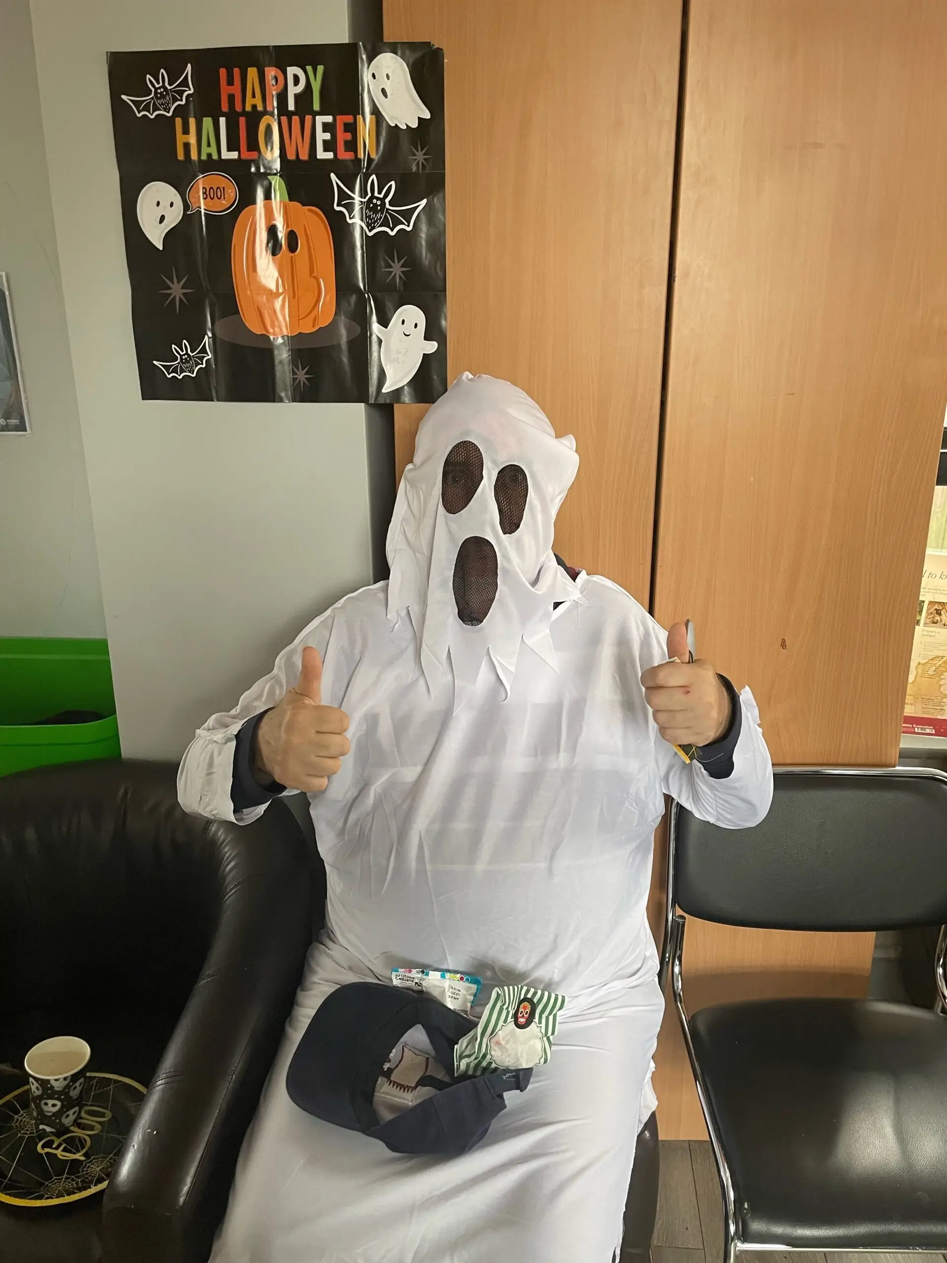 resident dressed as ghost