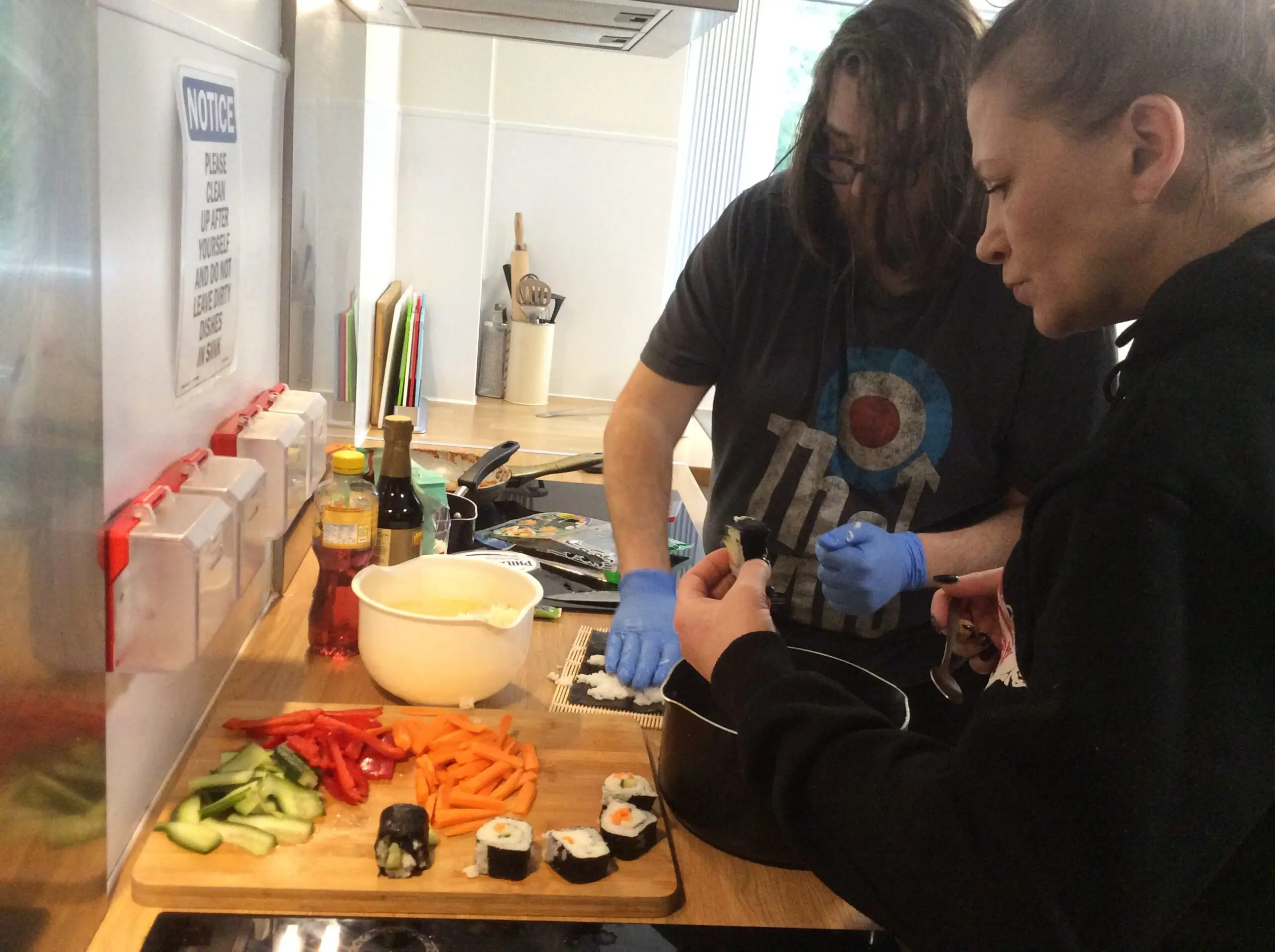 residents preparing sushi