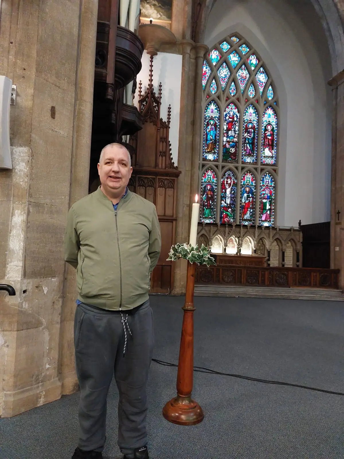 resident in church next to candle