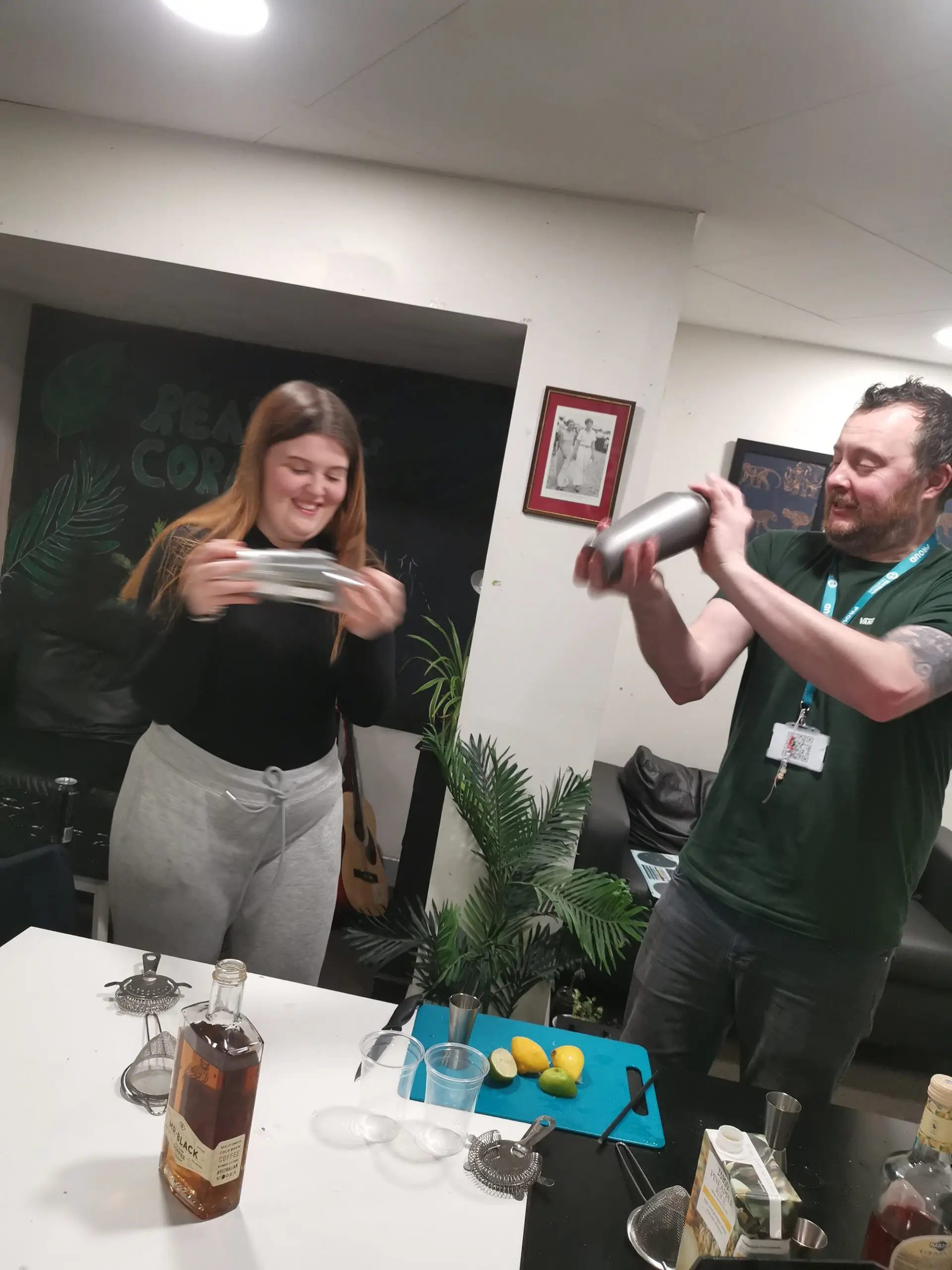resident and team member shaking mocktails