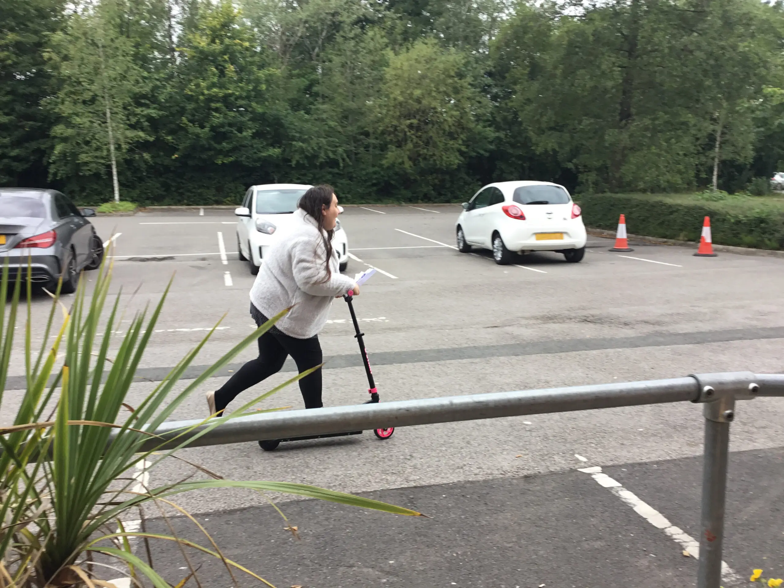 female resident on scooter