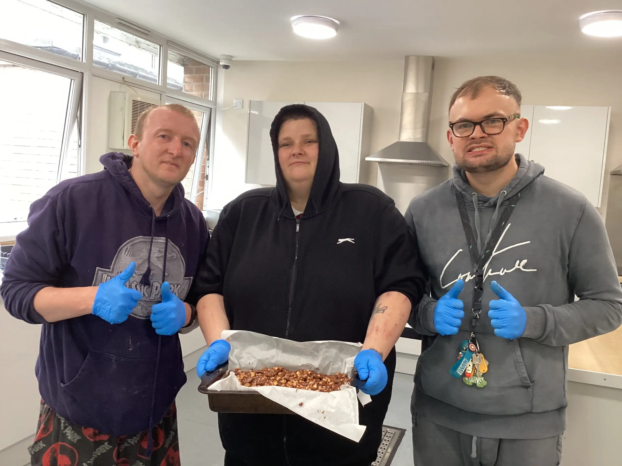 Kirk House residents making rocky road slices